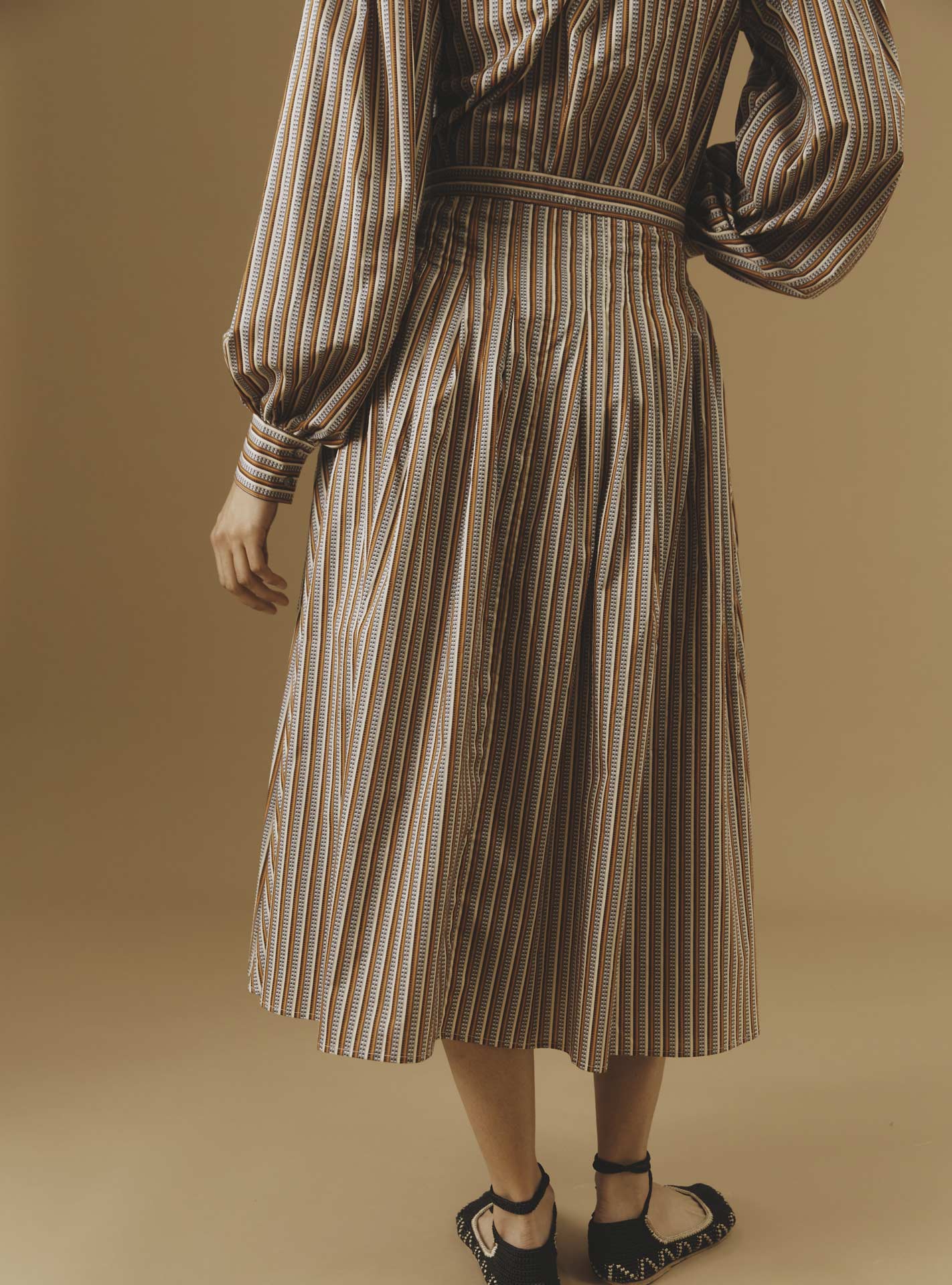 Back view of Zazou copper Cotton Skirt by Thierry Colson