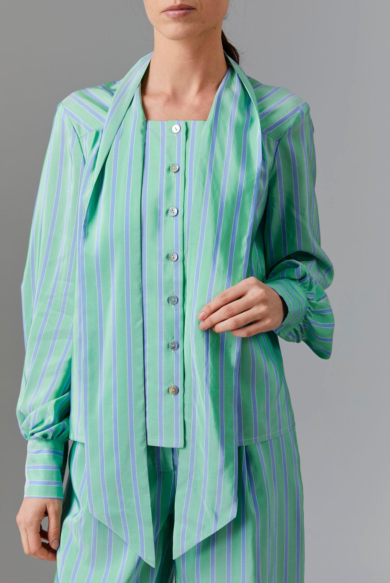 Front view of Alba Blouse with untied collar - Silk Road Stripes - Green / Blue by Thierry Colson