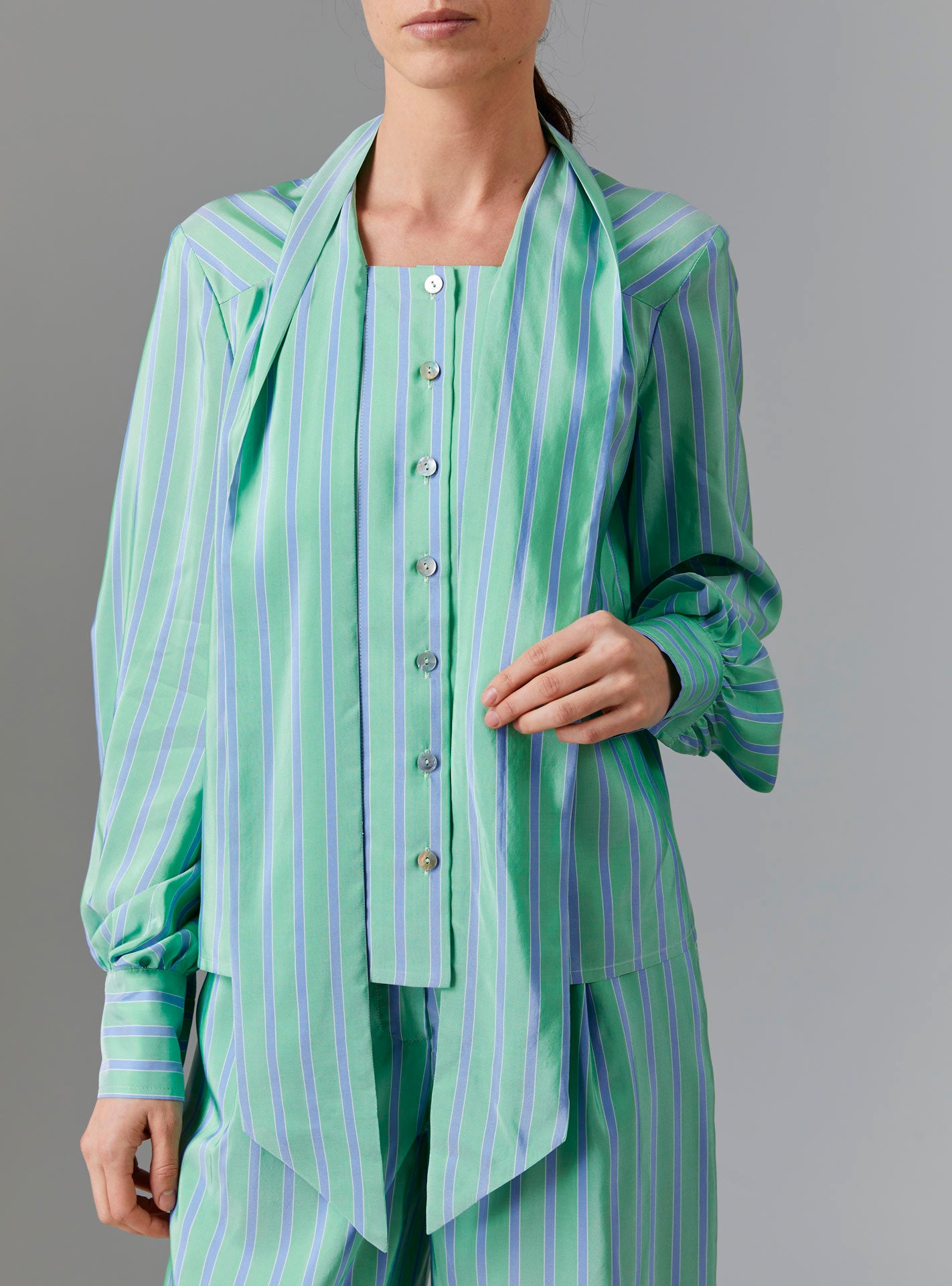 Front view of Alba Blouse with untied collar - Silk Road Stripes - Green / Blue by Thierry Colson