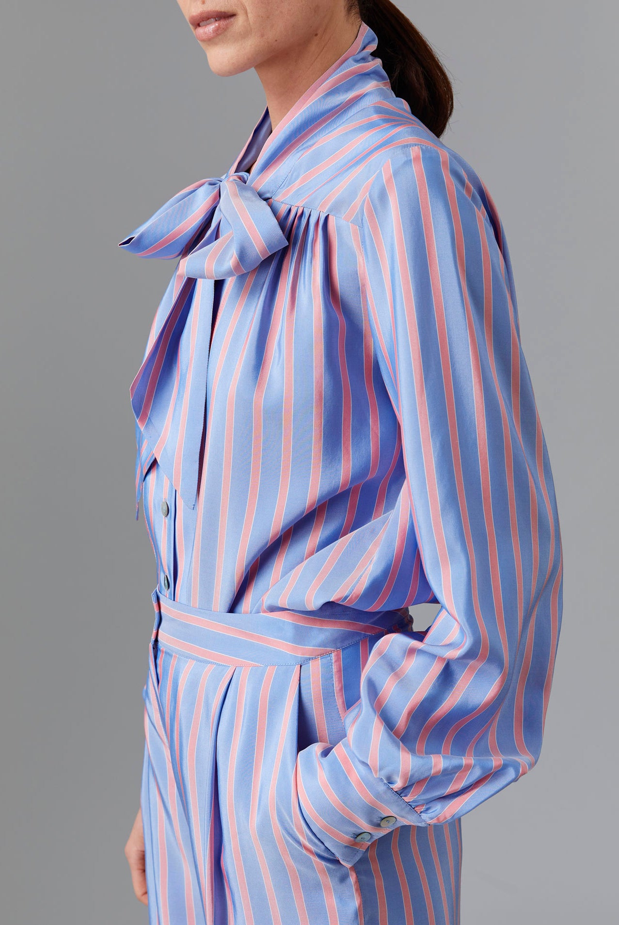Side view of Alba Blouse - Heaven Blue/Pink Silk Road Stripes by Thierry Colson