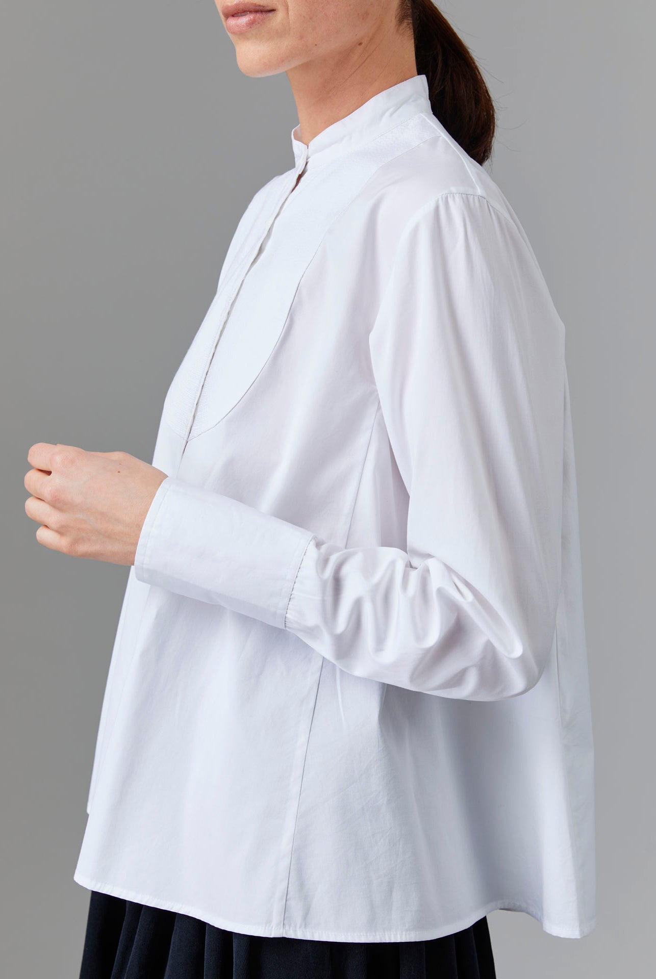Side view of Ali Shirt - Off White Poplin Topstitching by Thierry Colson