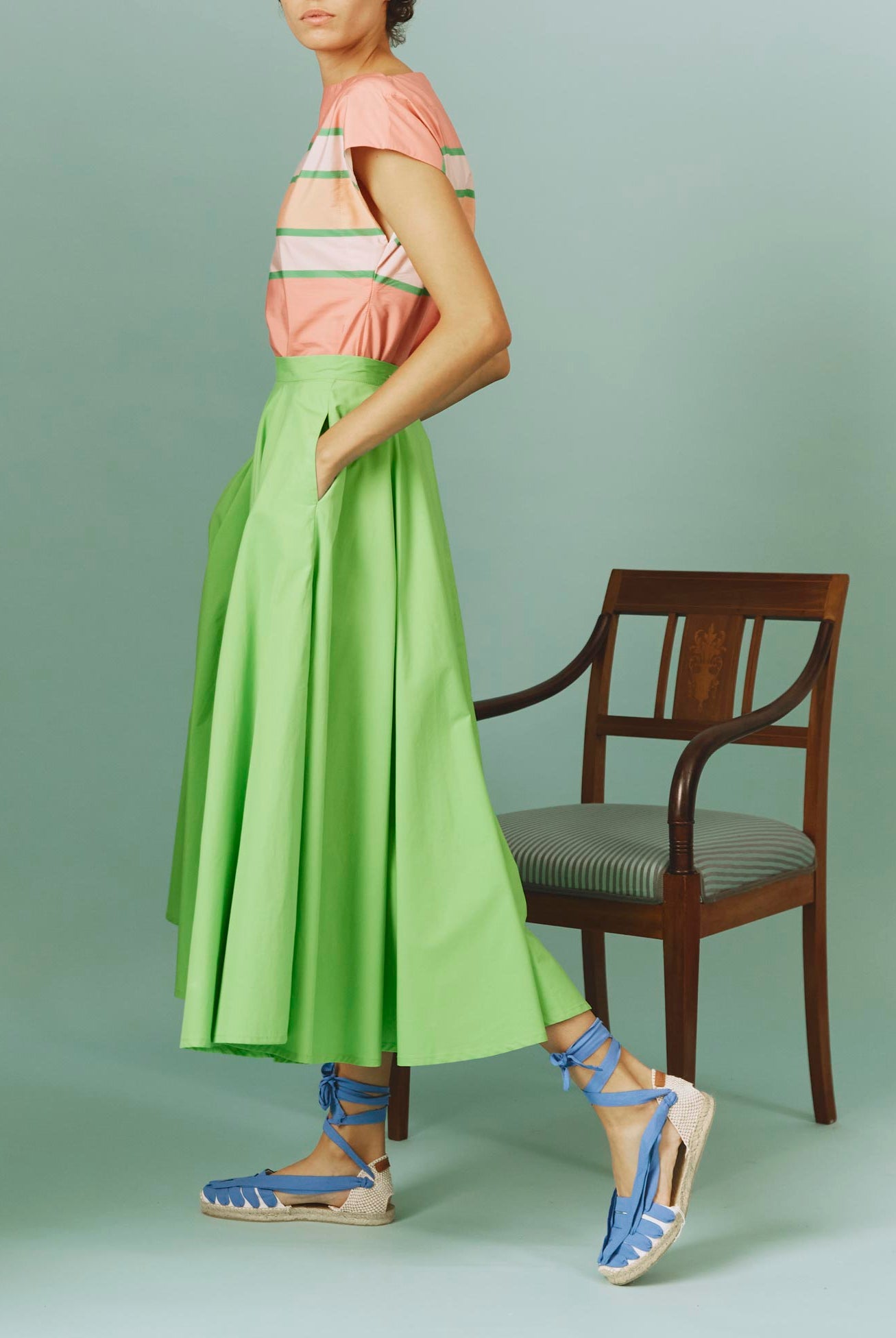 Side view of Audrey Skirt: Matisse Plain Poplin in Green by Thierry Colson