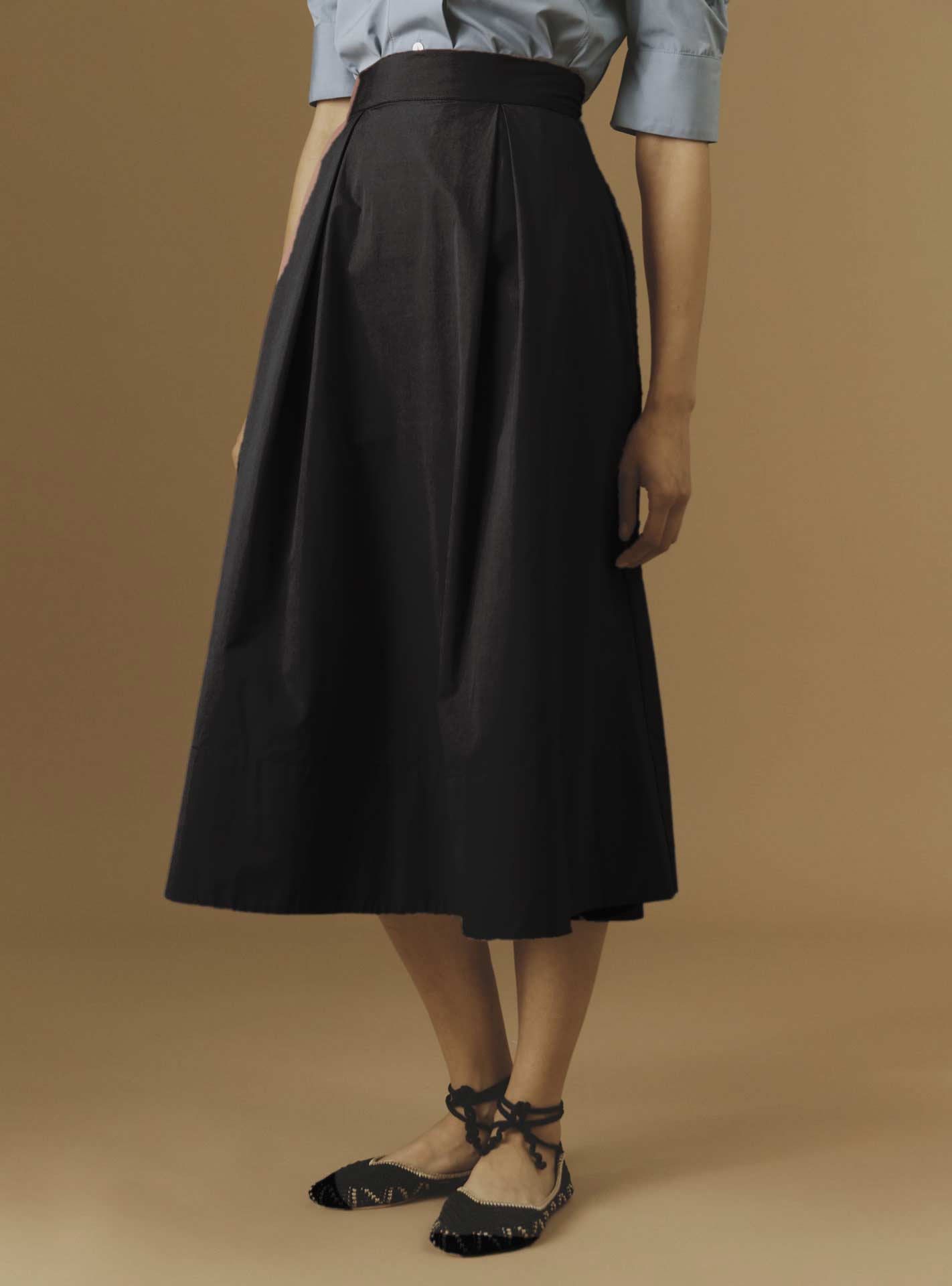 Front view of Wynona Black plain poplin skirt by Thierry Colson