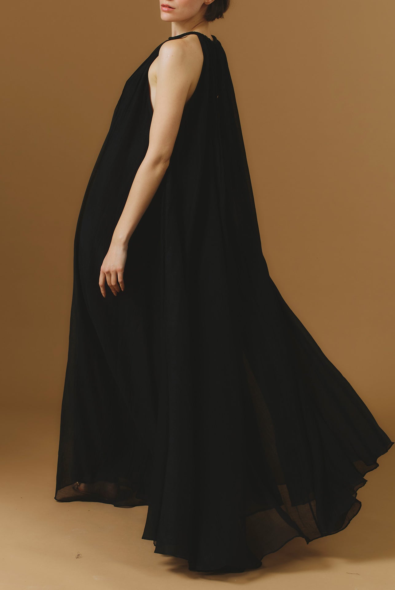 Side back view of Zenith Chanderi Appliqué Black Long Dress by Thierry Colson