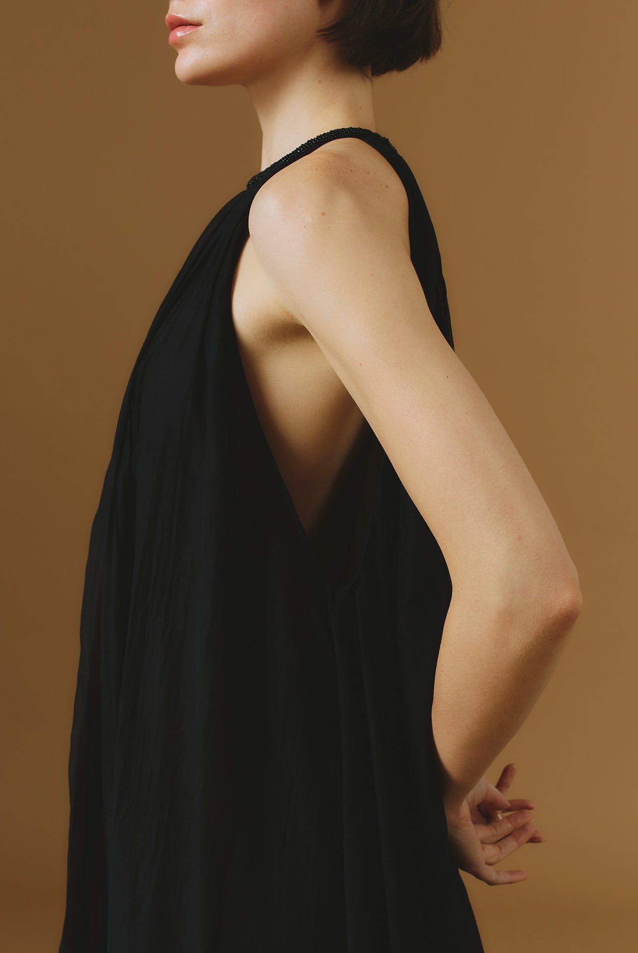 Side detail view of Zenith Chanderi Appliqué Black Long Dress by Thierry Colson