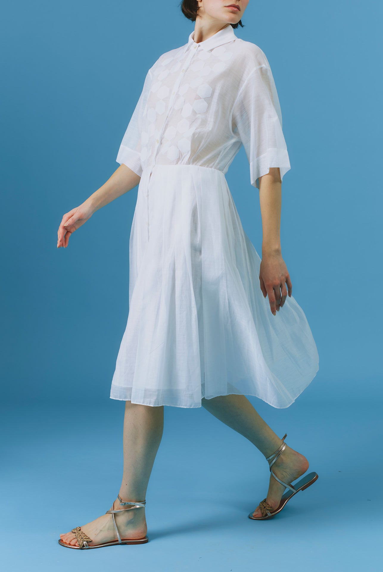Side view of Oriane white knee dress by Thierry Colson