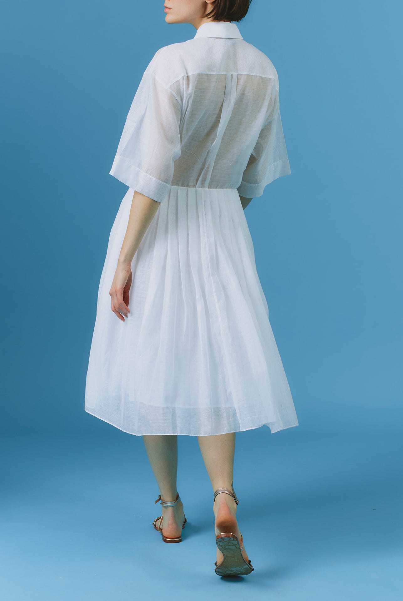 Back view of Oriane white knee dress by Thierry Colson