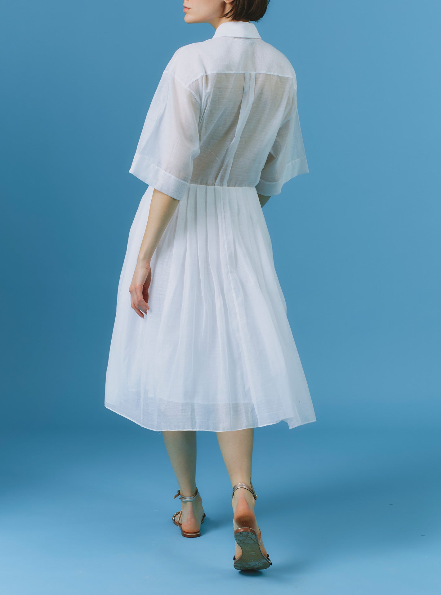 Back view of Oriane white knee dress by Thierry Colson