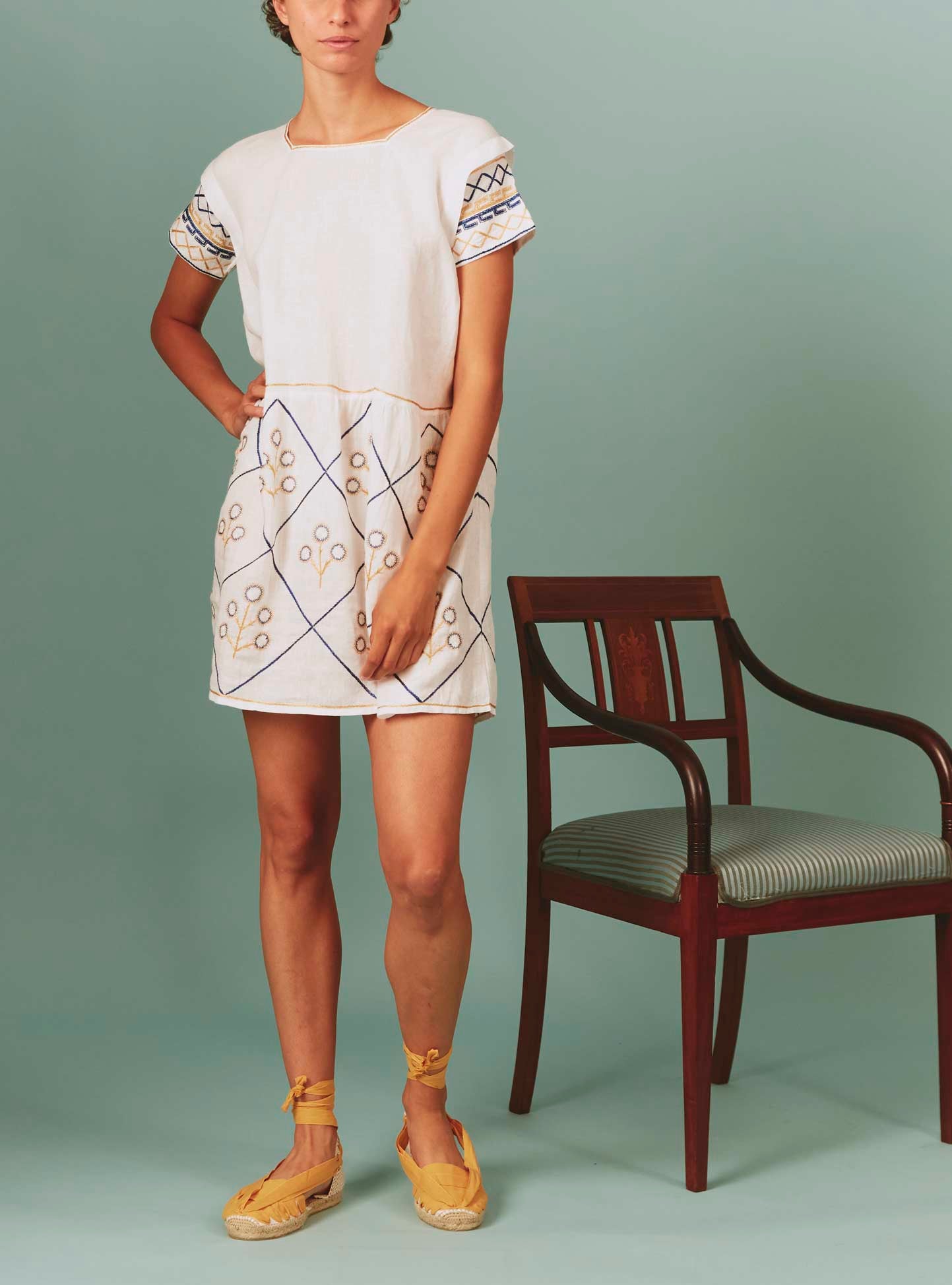 Front view of Allison Mini Dress: Archaic Embroidery in White by Thierry Colson