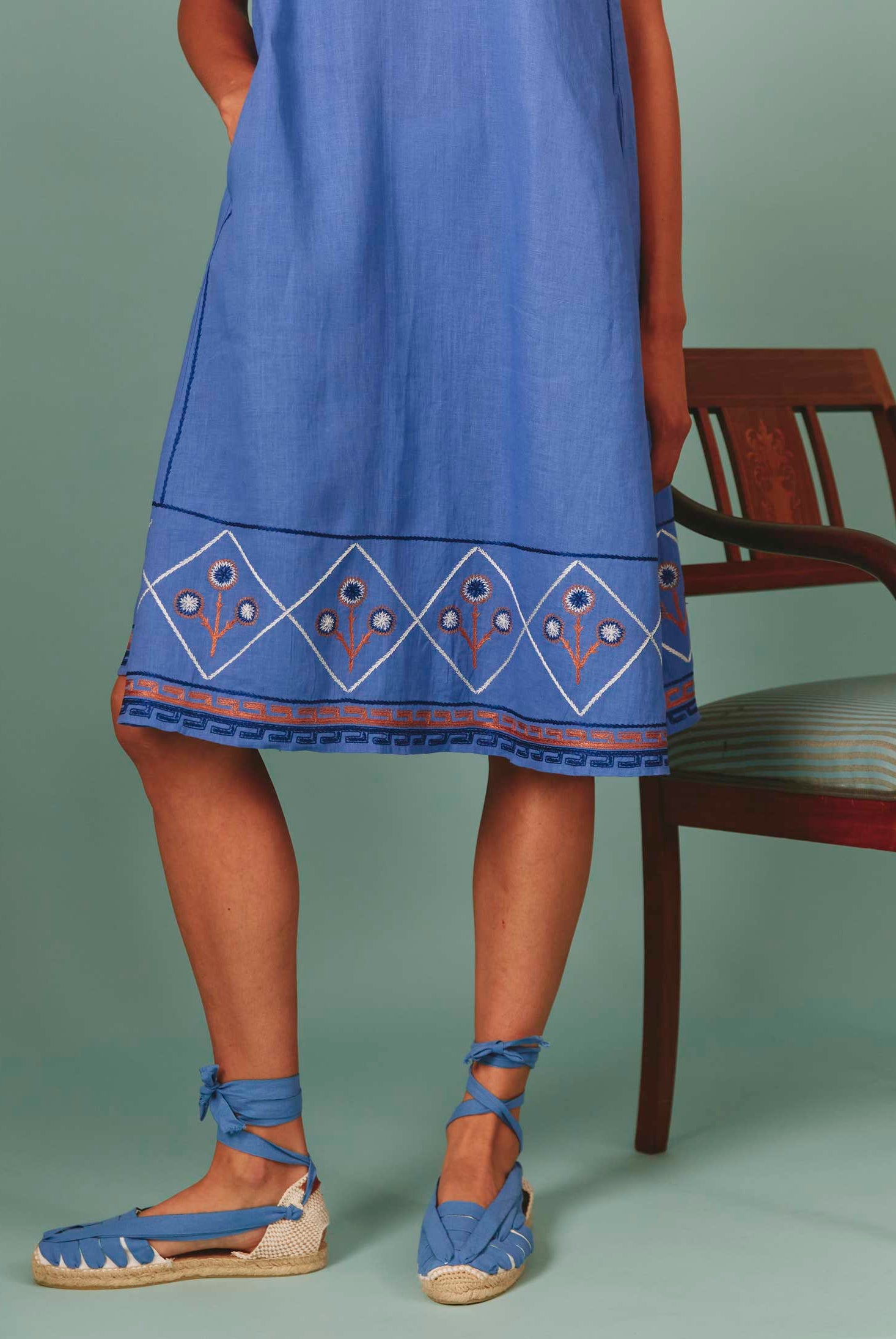 Detailed view of bottom of Lavender Archaic Embroidery Apolonia Midi by Thierry Colson