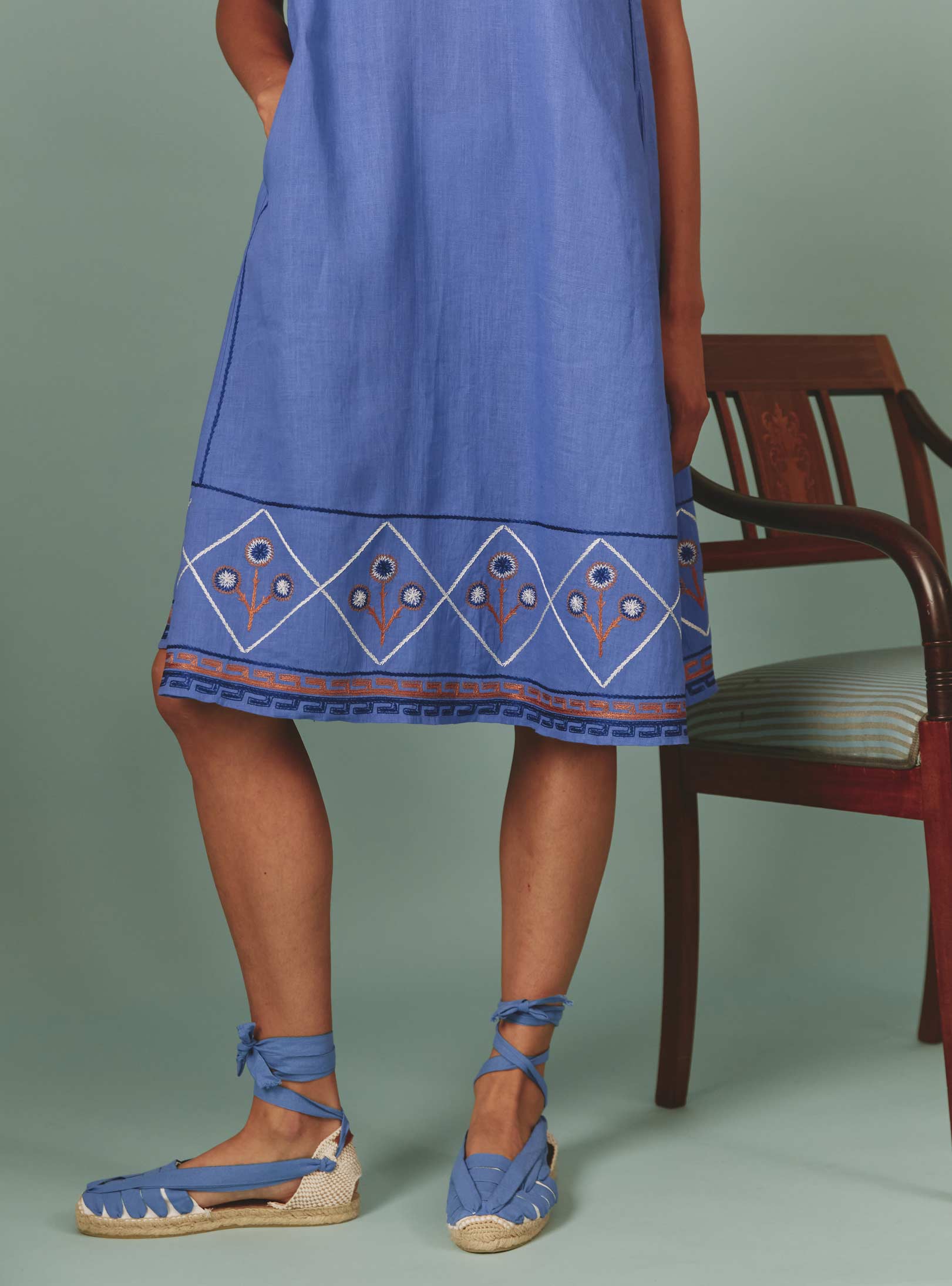 Detailed view of bottom of Lavender Archaic Embroidery Apolonia Midi by Thierry Colson