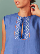 Detailed view of neckline of Lavender Archaic Embroidery Apolonia Midi by Thierry Colson