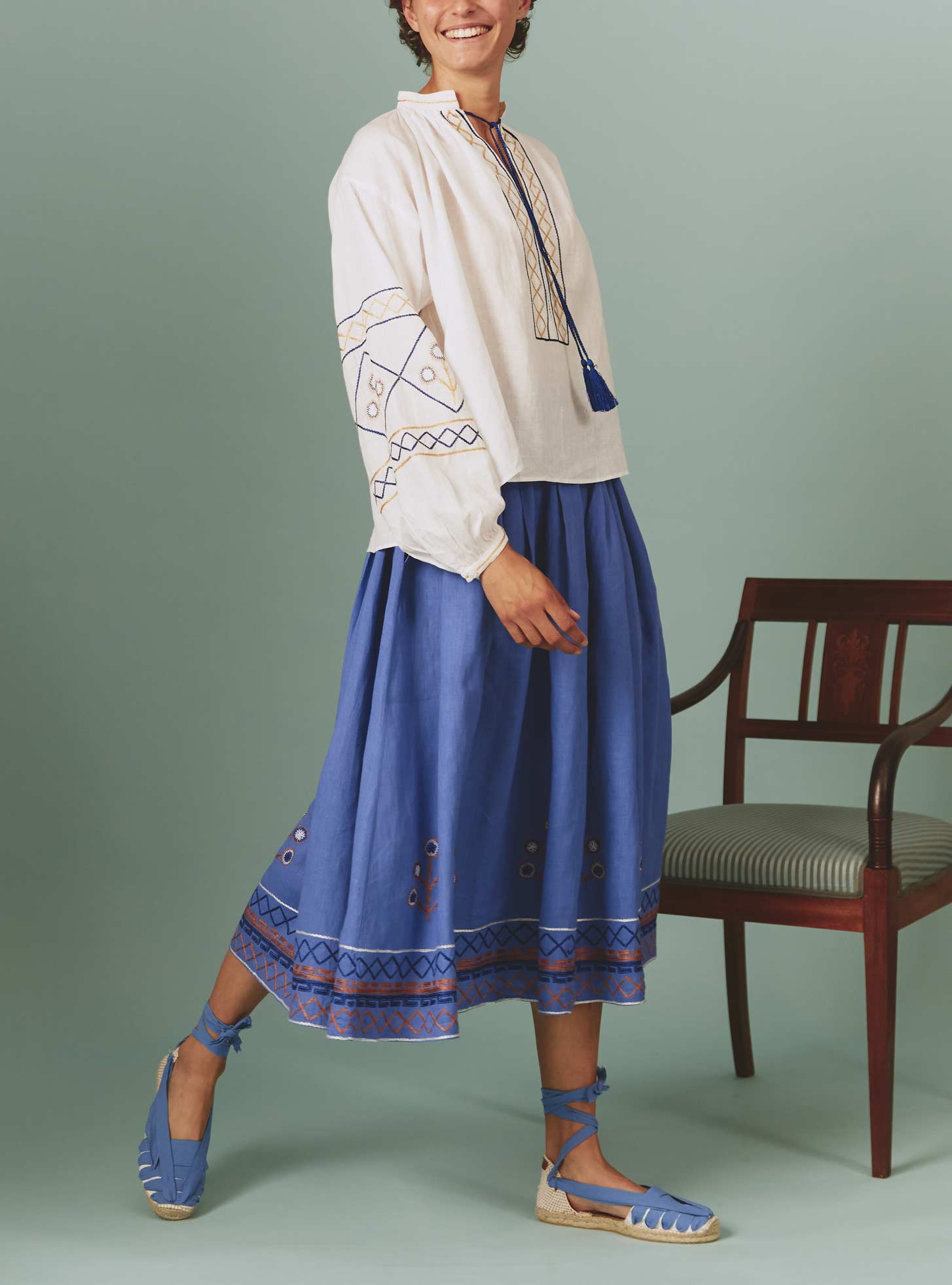 Side view of Guise Blouse with Archaic Embroidery in White by Thierry Colson