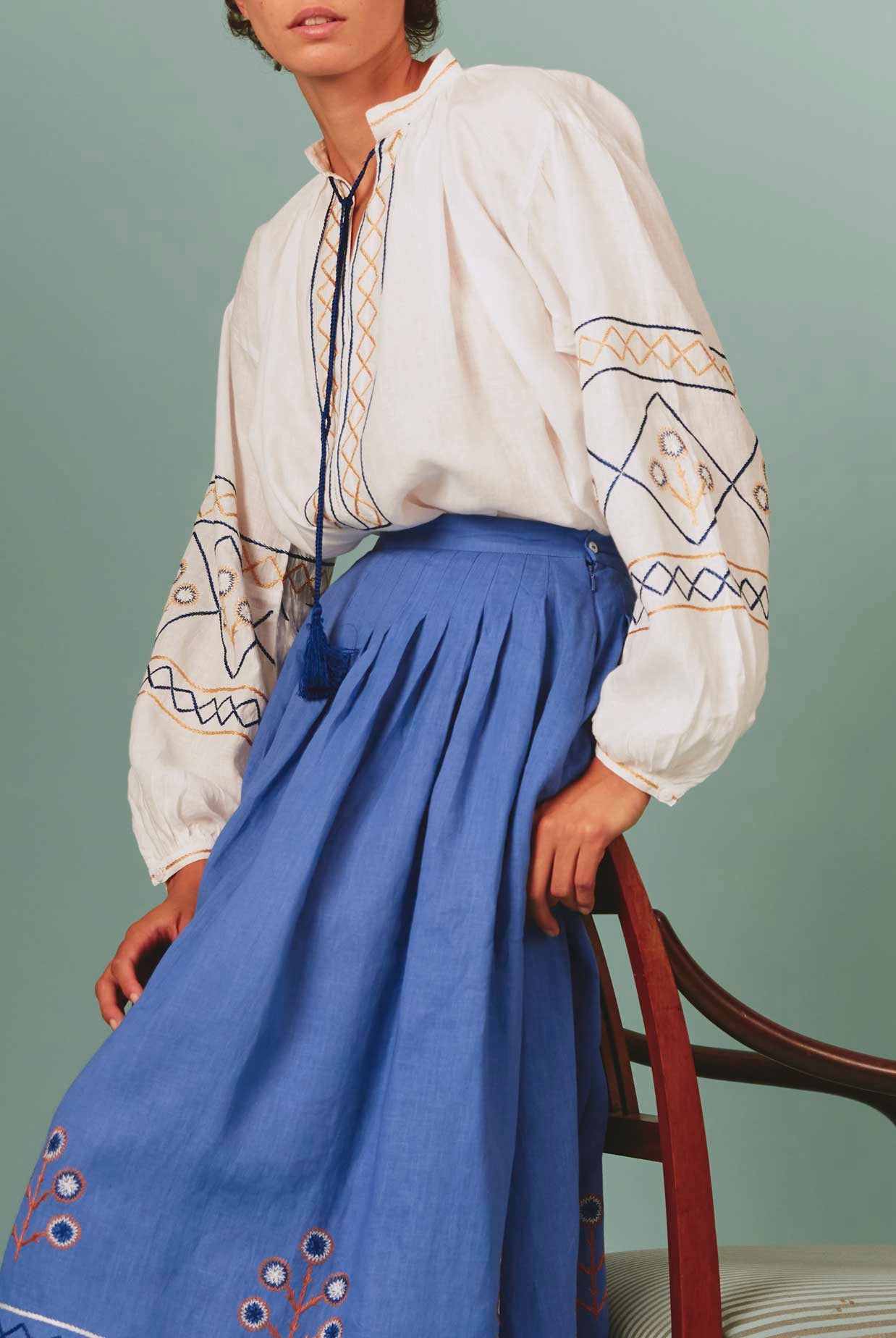 Side view of Lavender Zazou Skirt with White Guise Blouse: Archaic Embroidery by Thierry Colson