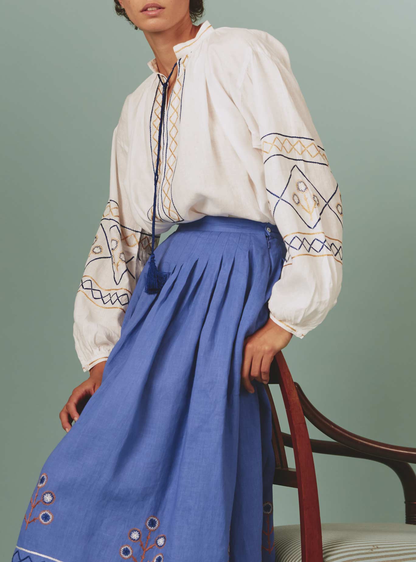 Side view of Lavender Zazou Skirt with White Guise Blouse: Archaic Embroidery by Thierry Colson