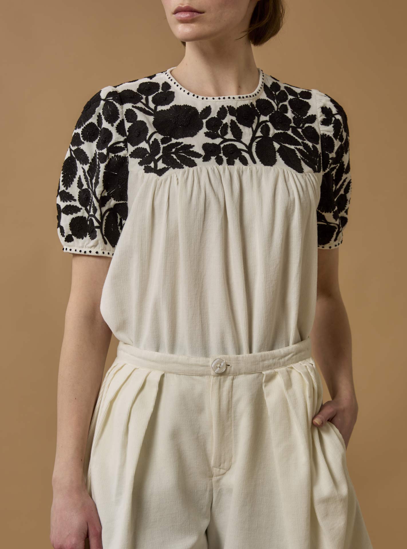 Detail Front view of Olympia Embroidered Corduroy Cream/Black Top with Kenya Shorts by Thierry Colson