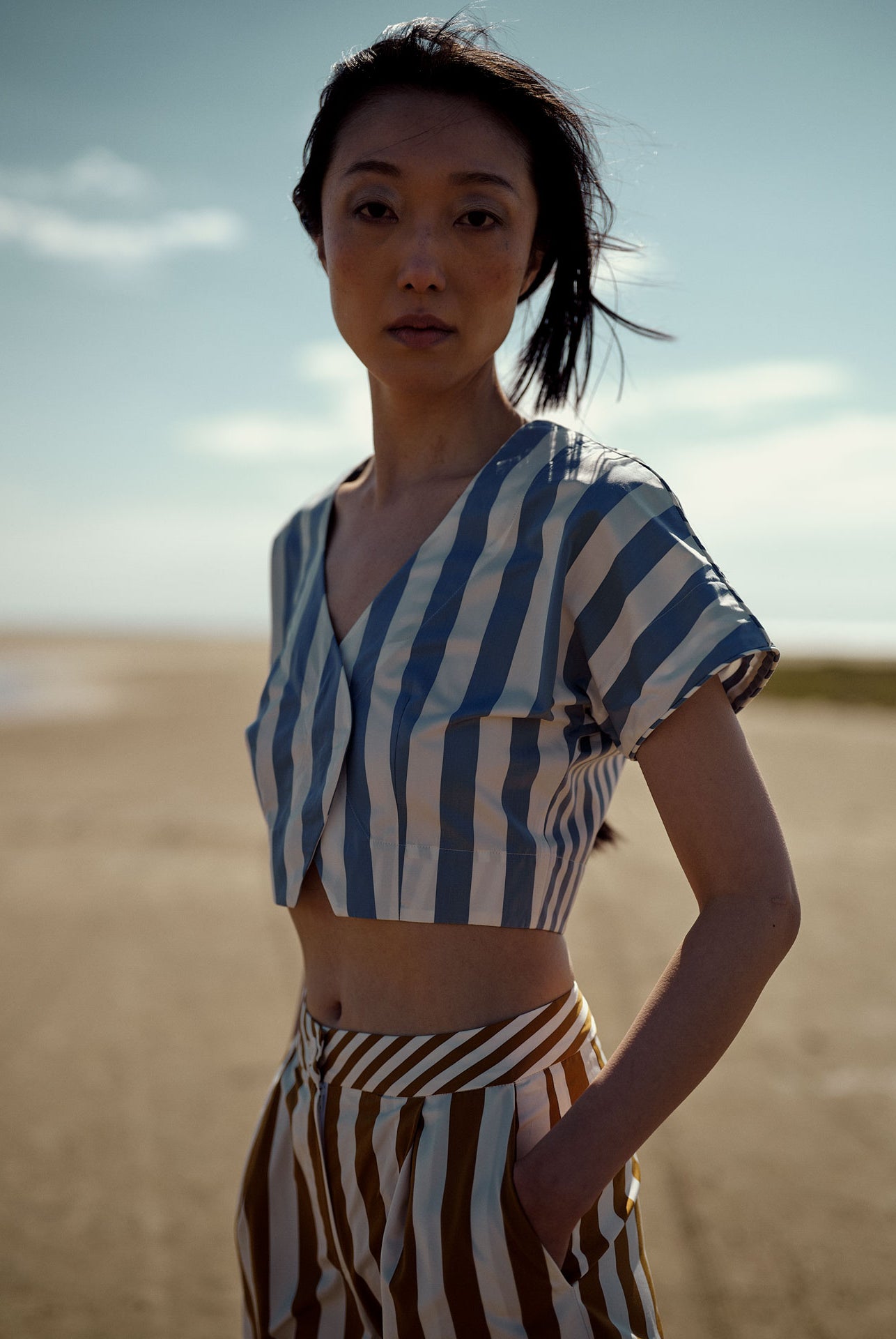 Other view - Model wearing Bianca Vest with Loulou trousers in Tobacco stripes.