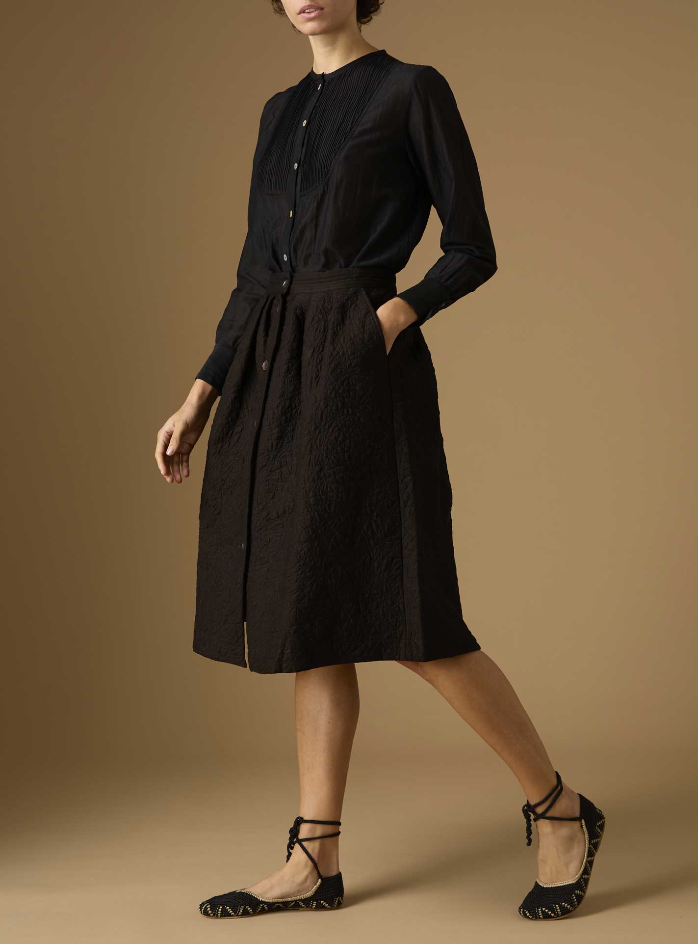 Side view of Riviera Black Cotton Silk Skirt by Thierry Colson