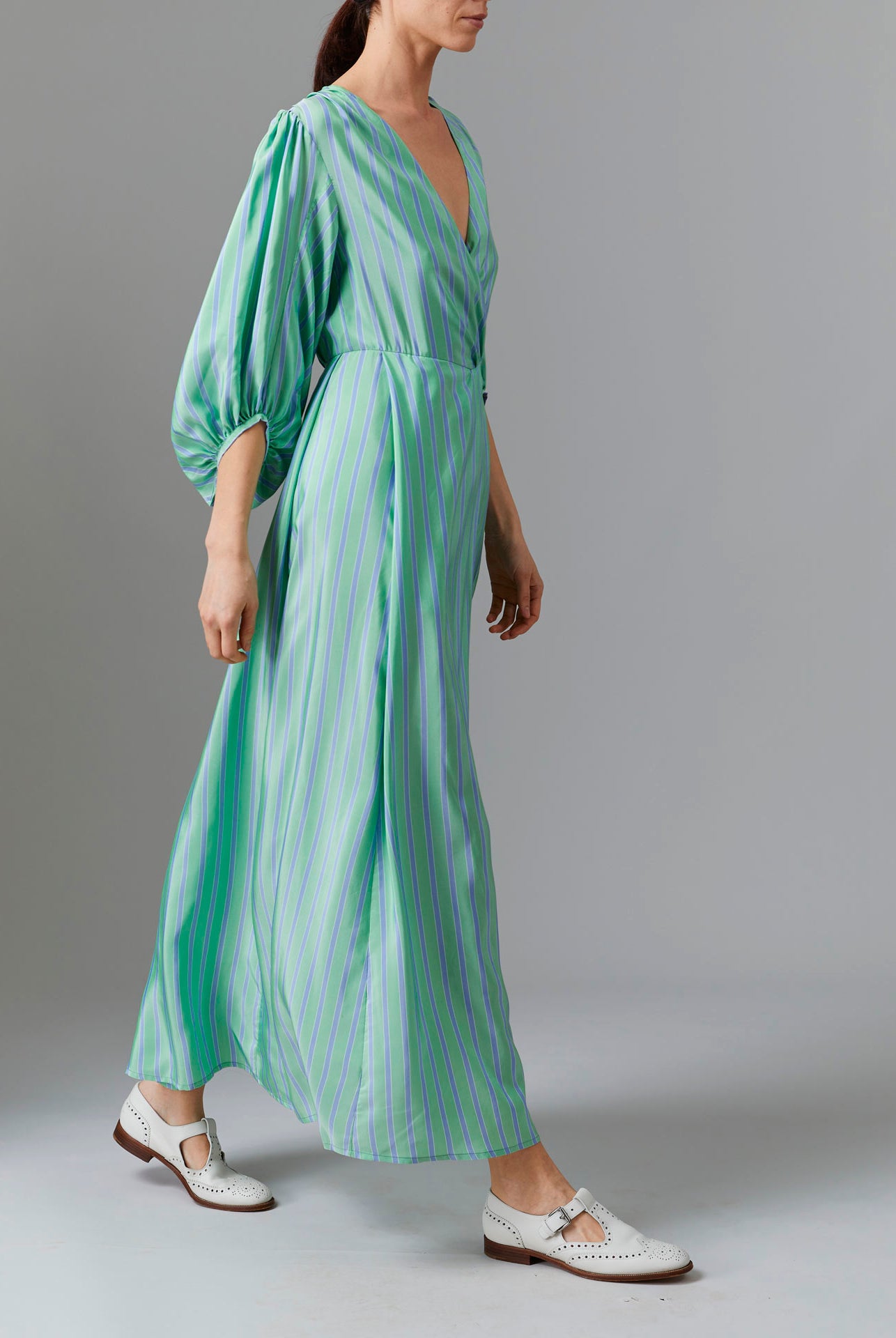 Side view of Phoebe Long Dress - Silk Road Stripes in Green/Blue | Thierry Colson Fall 2024 Collection