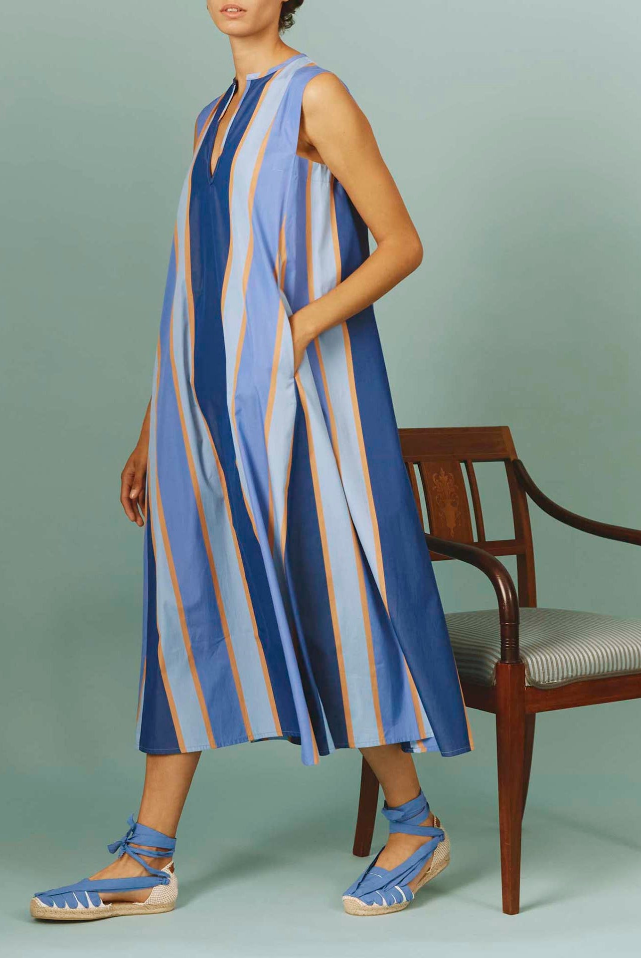 Side view of Apolonia Kaftan: Samarkand Stripes - Blue/Arancio | Spring/Summer 2024 by Thierry Colson