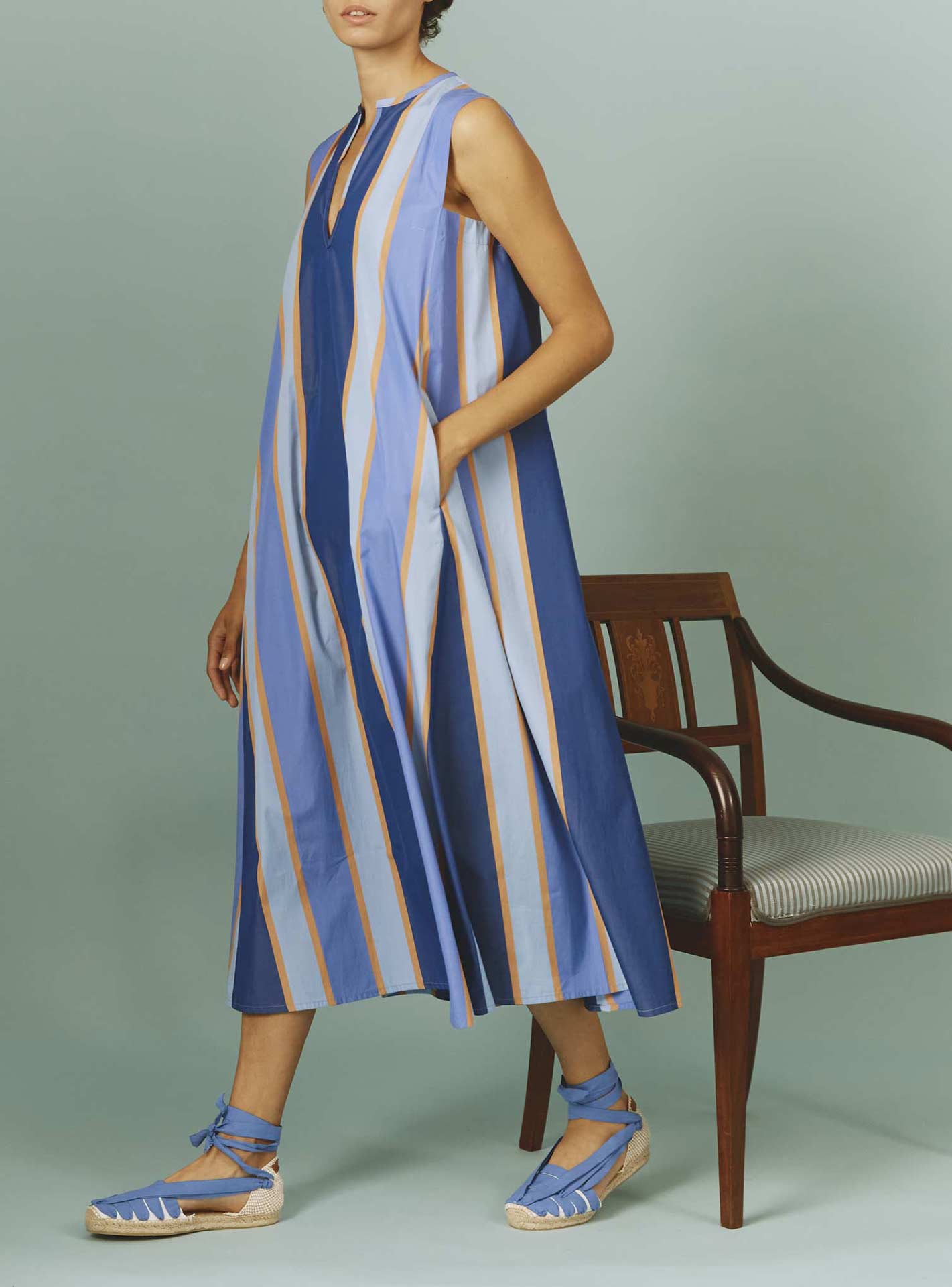 Side view of Apolonia Kaftan: Samarkand Stripes - Blue/Arancio | Spring/Summer 2024 by Thierry Colson