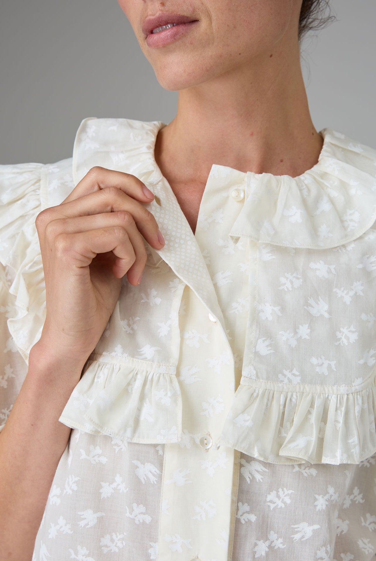 Front detail of Vanina Romantic Blouse Hand Block-Printed Birds Flowers Ruffled Collar by Thierry Colson