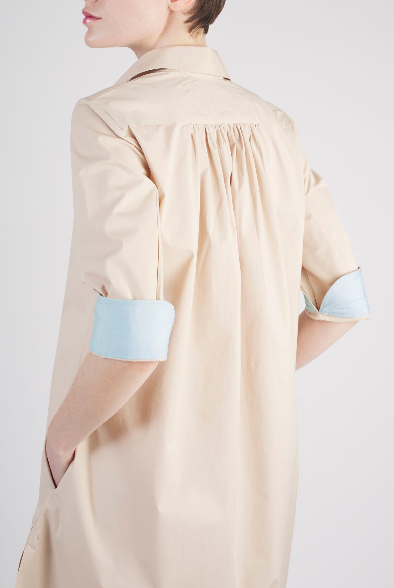 Back view of Angelica beige shirt dress by Thierry Colson