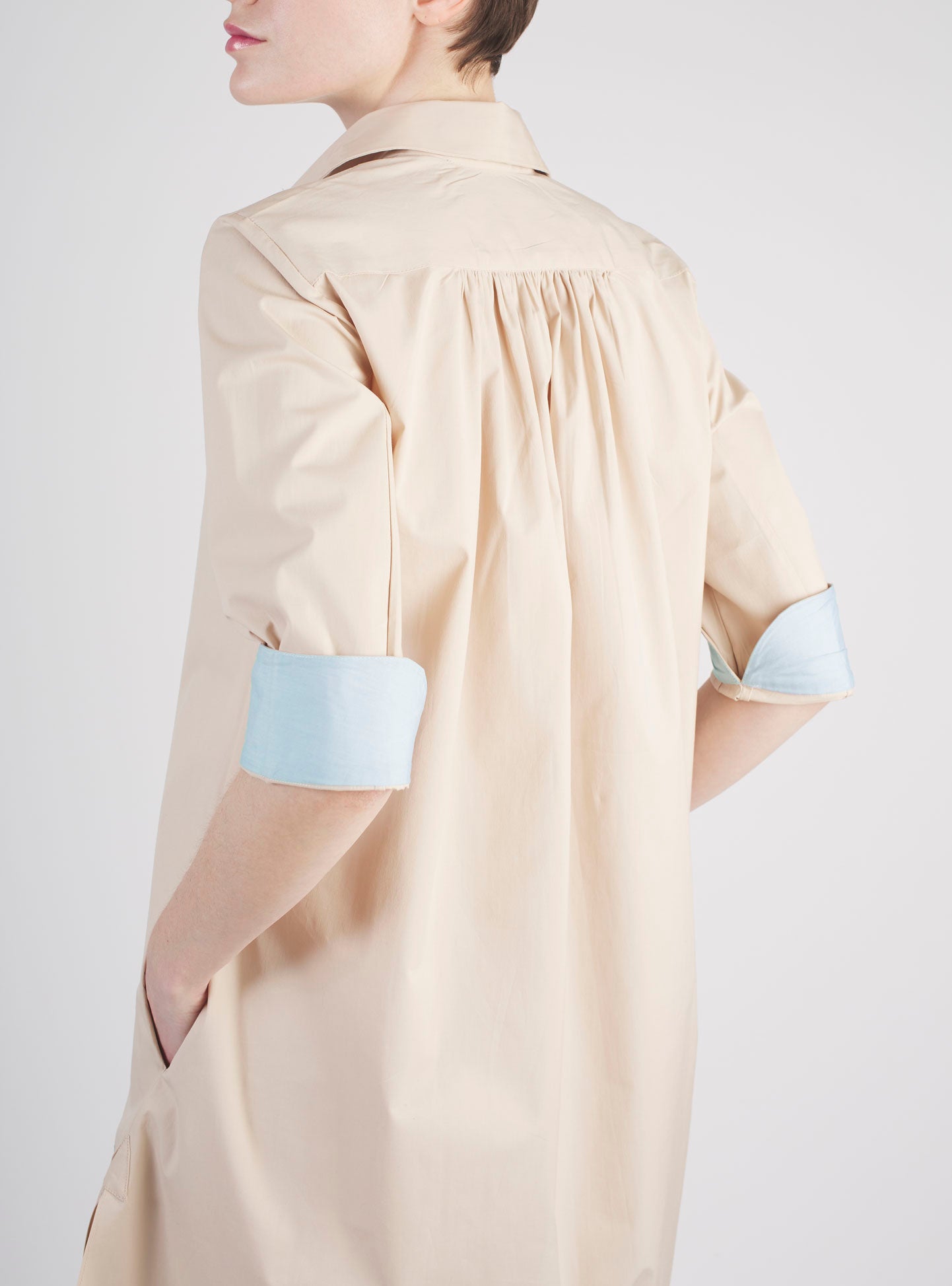 Back view of Angelica beige shirt dress by Thierry Colson