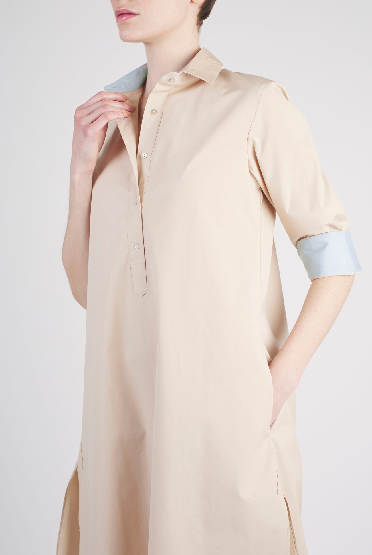 Close-up of Angelica beige shirt dress by Thierry Colson