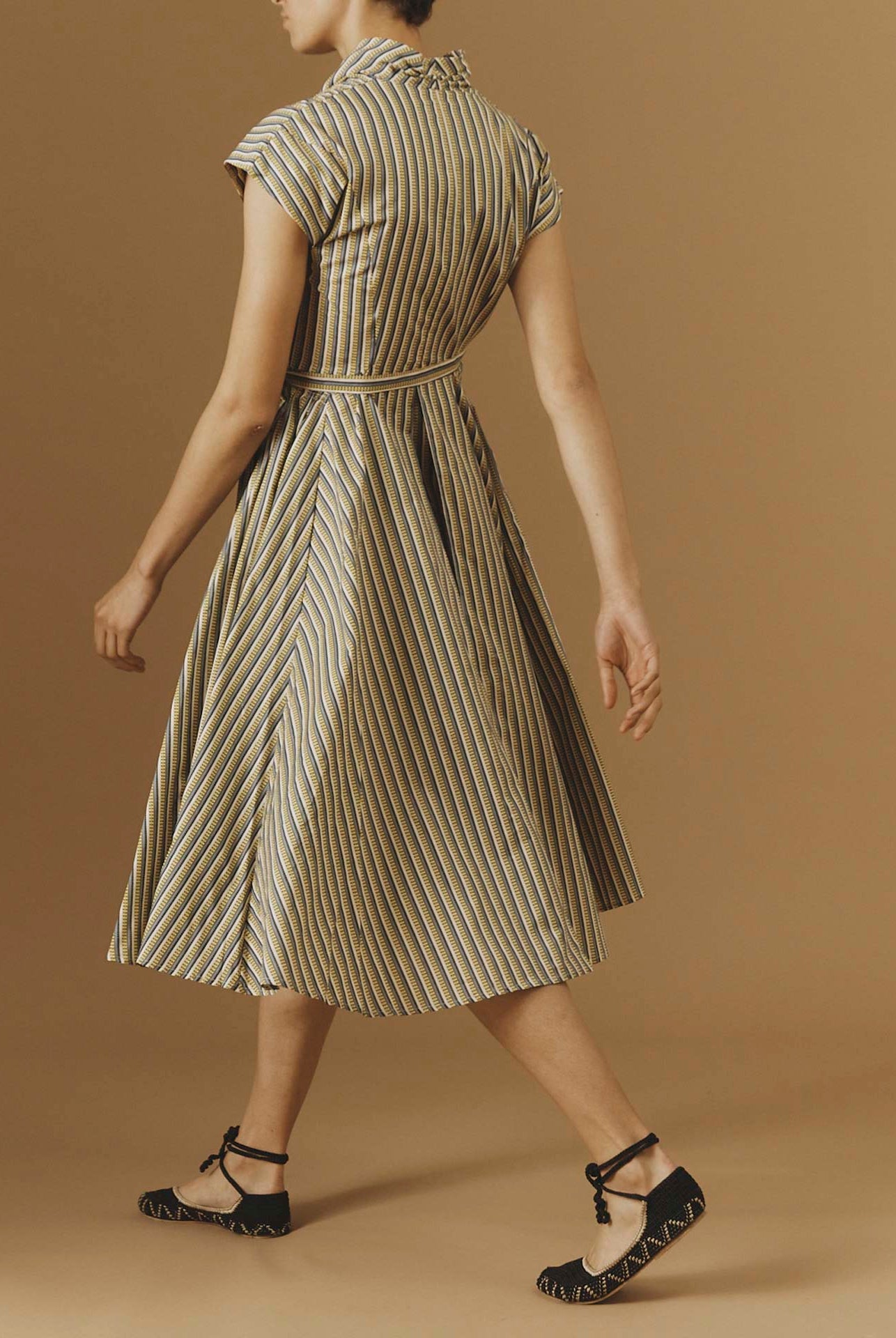 Side view of Isolde Yellow 2 midi Dress by Thierry Colson