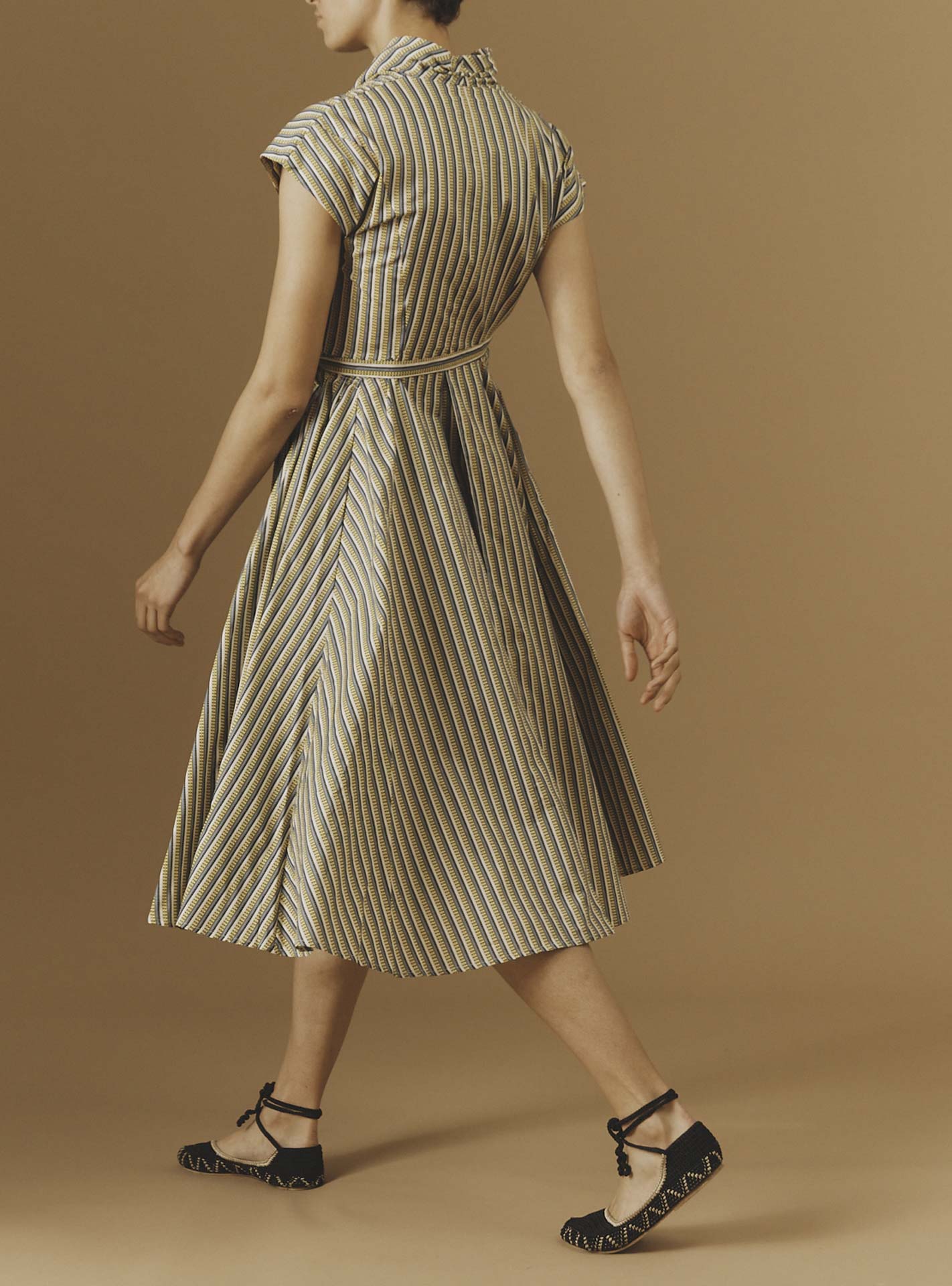 Side view of Isolde Yellow 2 midi Dress by Thierry Colson