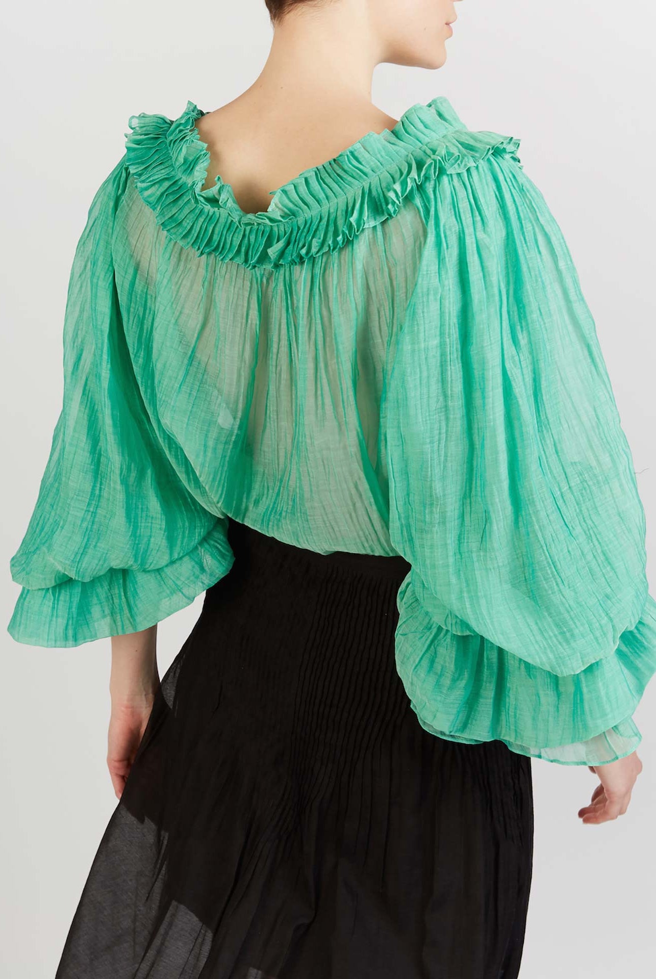 Back view of Roussia Veridian Green Blouse by Thierry Colson photographed by Stéphane Gautronneau