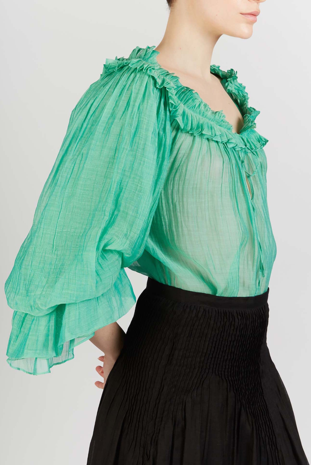 Side view of Roussia Veridian Green Blouse by Thierry Colson