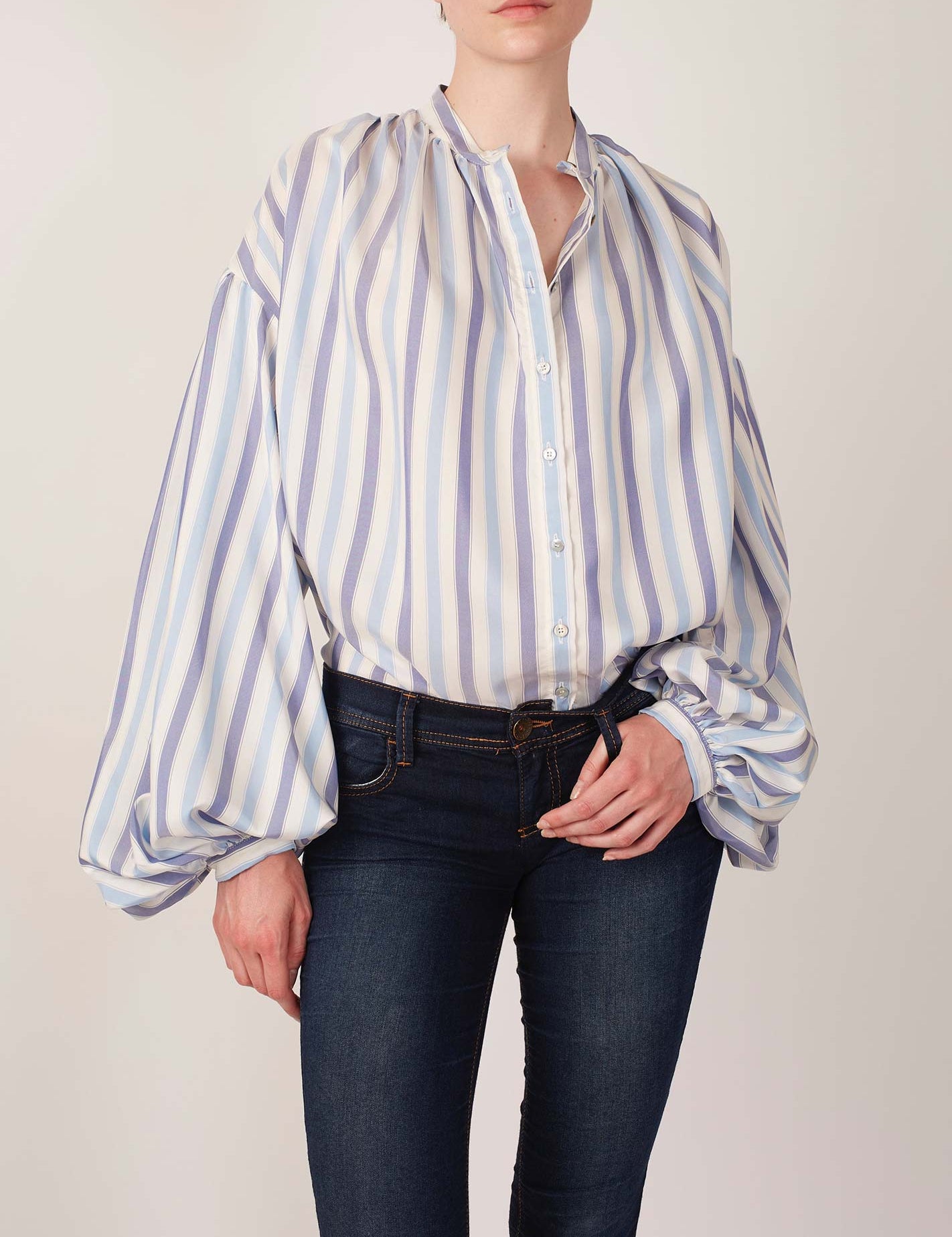 Front view of Slava Ottoman Stripes Blue Sky & Navy Blouse with a jeans by Thierry Colson