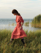 Denni is wearing a Vanina Barocco Scallops Rapsberry Blouse with Verde Skirt by Thierry Colson - photo Stéphane Gautronneau