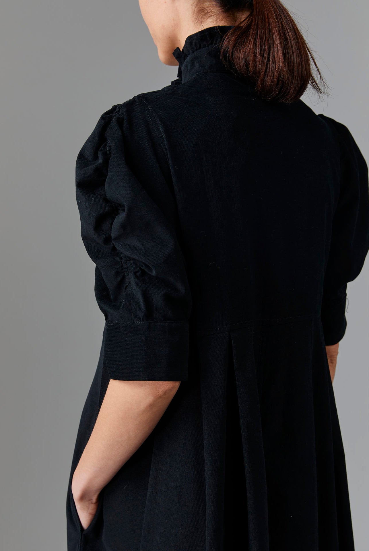 Close up view of Venetia Black Dress - Tirolean Cord by Thierry Colson