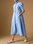 Side view of Venetia Plain Poplin Blue Dress by Thierry Colson
