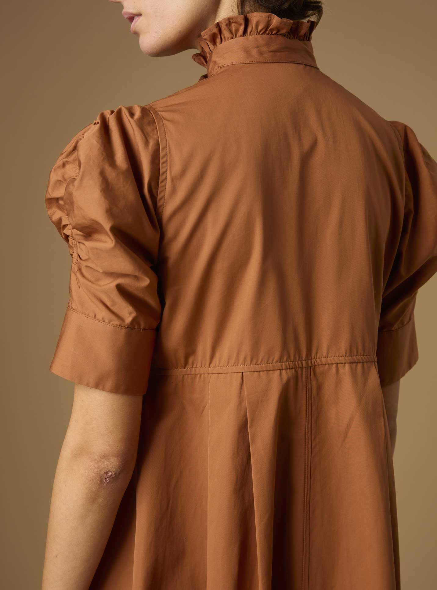 Back detail of Venetia Plain Poplin Hazelnut Dress by Thierry Colson