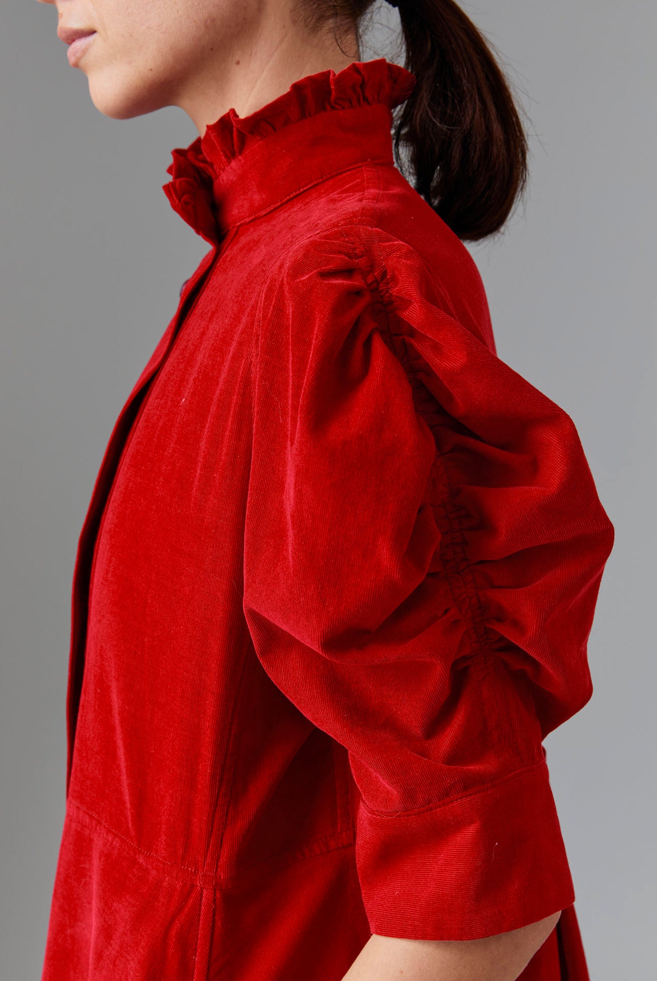 Close up view of Venetia Red Dress Sleeve - Tirolean Cord by Thierry Colson