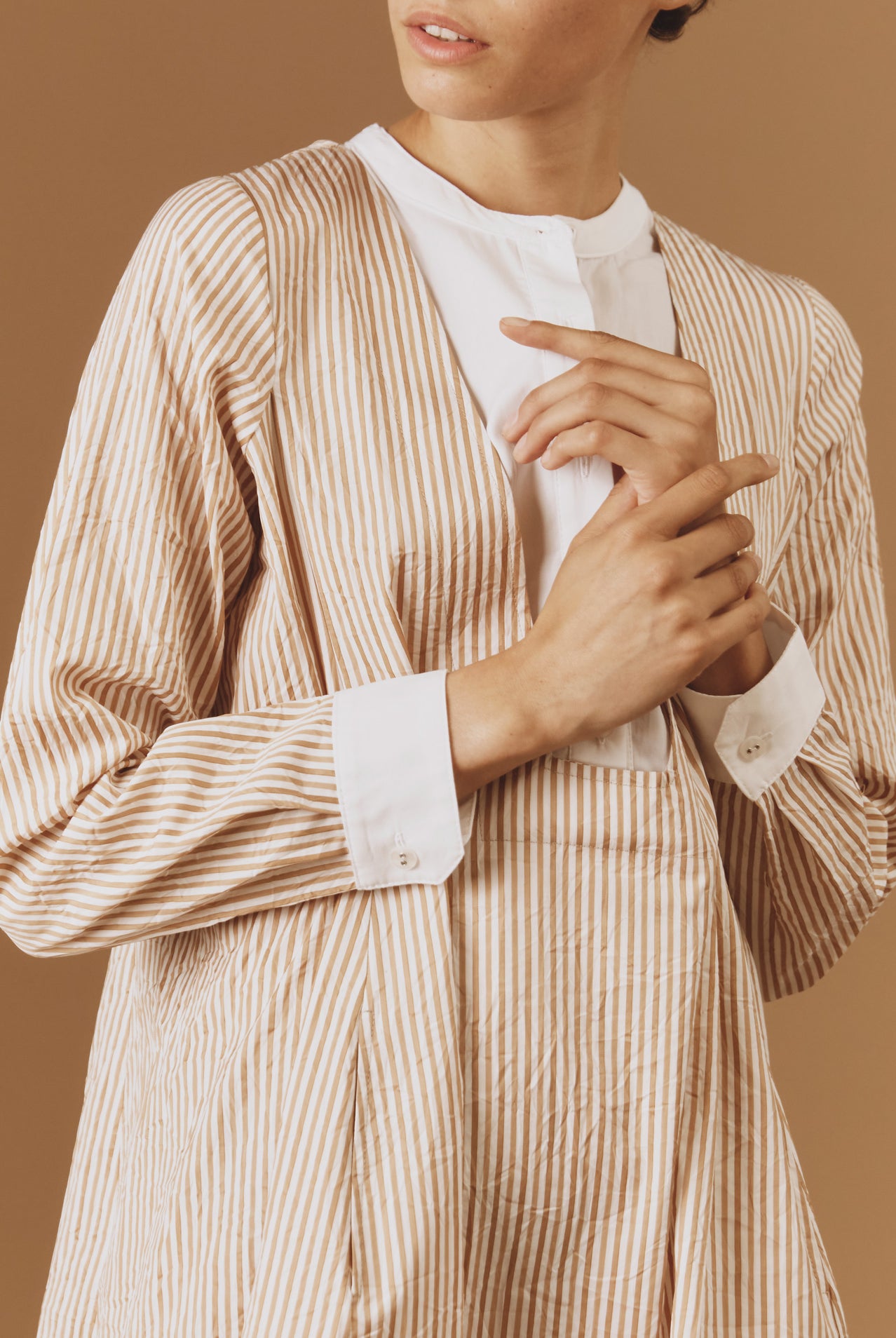 Detail of Victoria Cappuccino Midi Crinkle satin kaftan by Thierry Colson