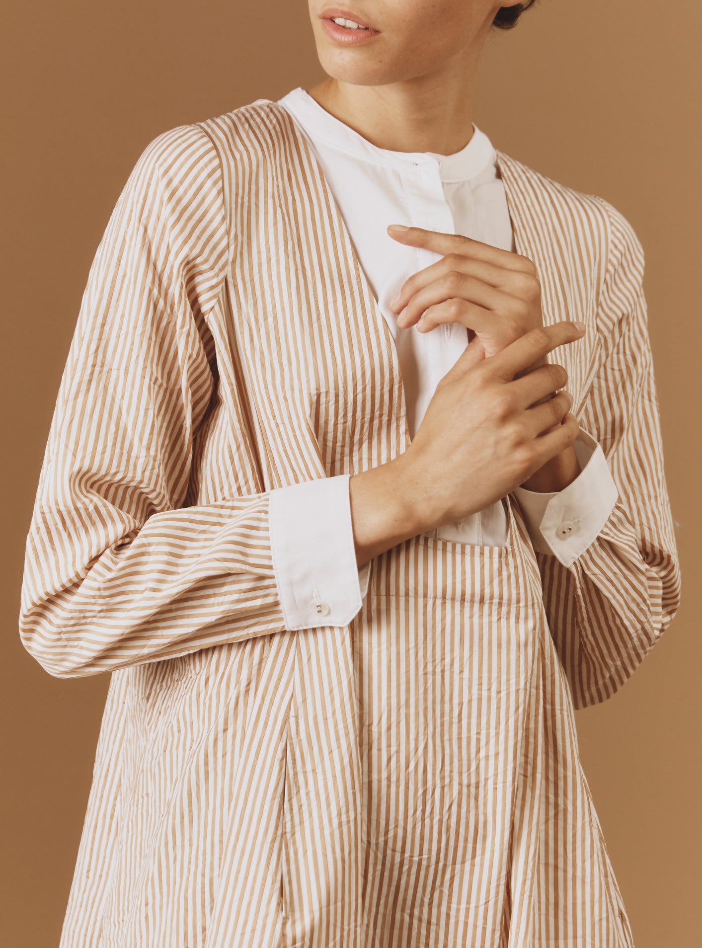 Detail of Victoria Cappuccino Midi Crinkle satin kaftan by Thierry Colson