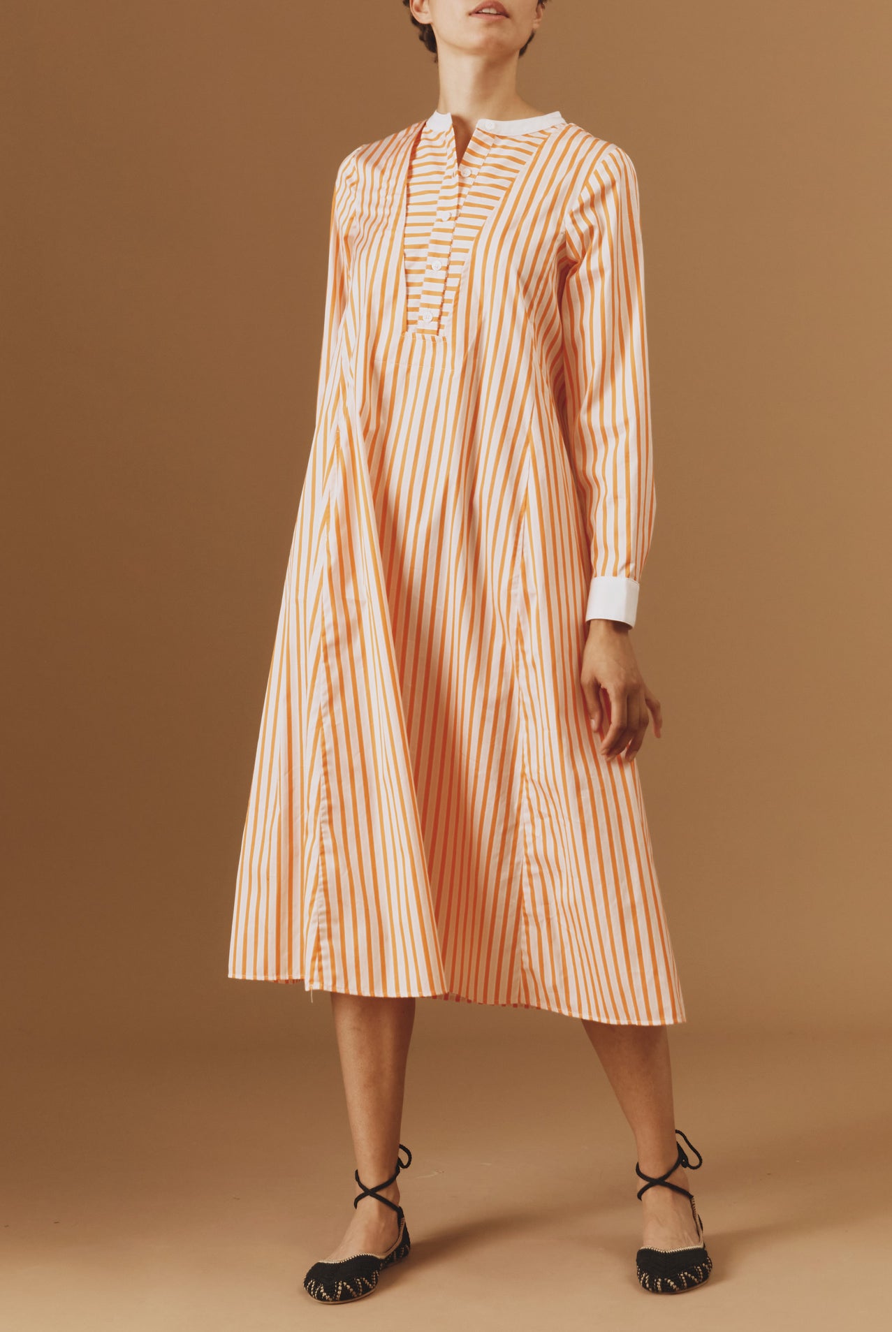Front view of Victoria Midi stripes Orange/Salmon/White kaftan by Thierry Colson