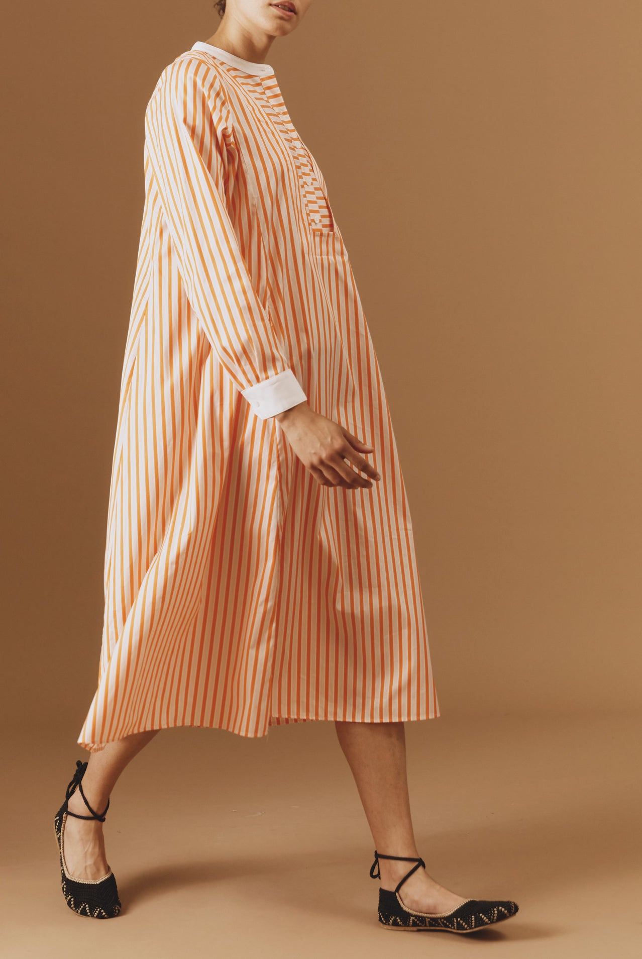 Side view of Victoria Midi stripes Orange/Salmon/White kaftan by Thierry Colson