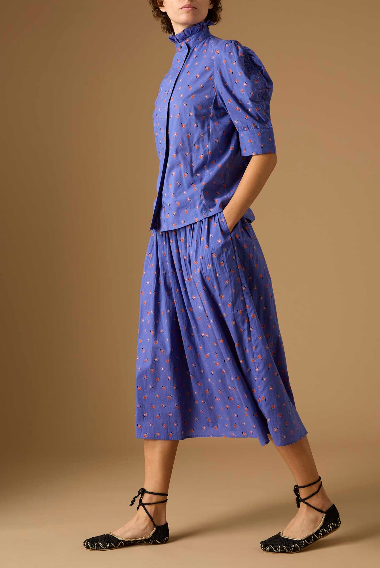 Full side view of Vita blue blouse and Verde blue Skirt from Pre Spring 2024 by Thierry Colson