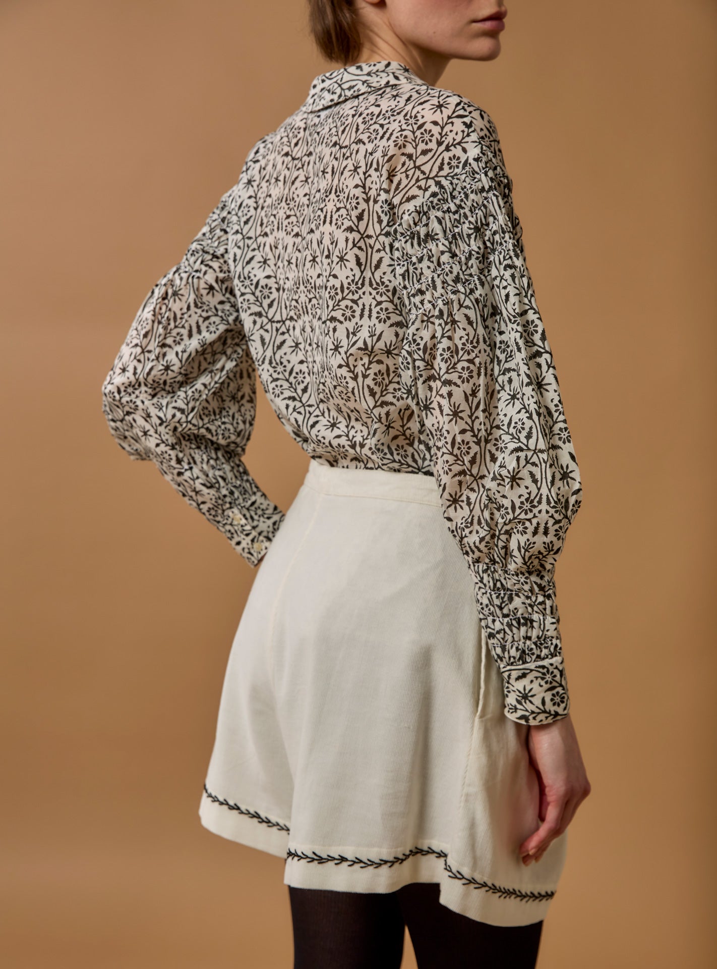 Back view of Zlata Black Blouse - Paper Cut Print by Thierry Colson