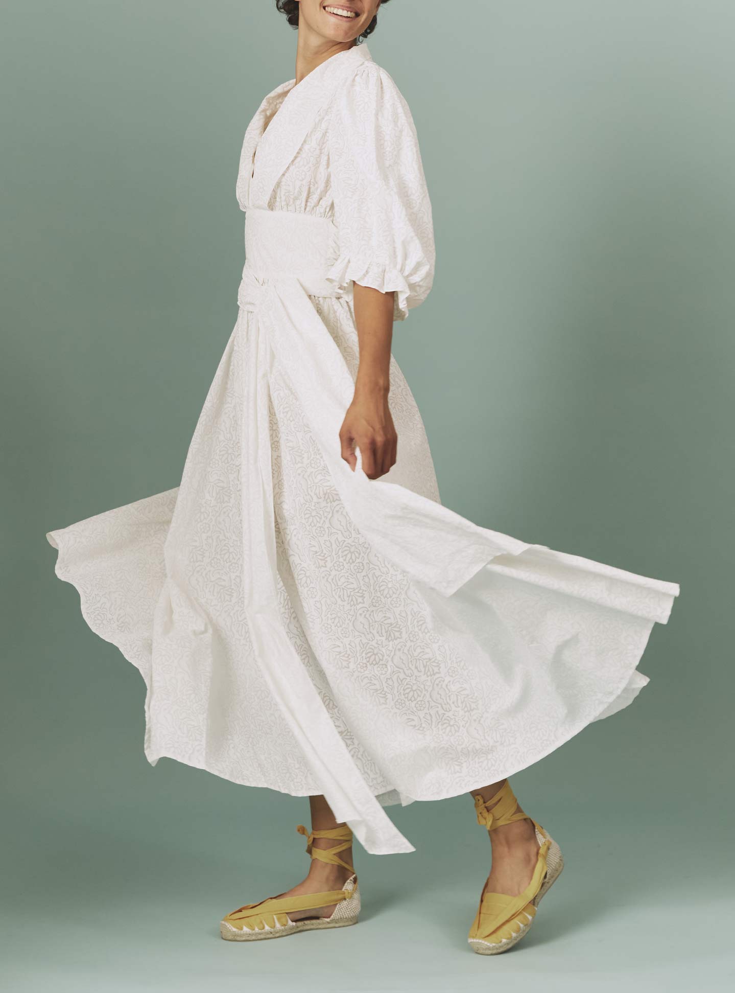 Side view of Zorah White Parrot Print Dress by Thierry Colson