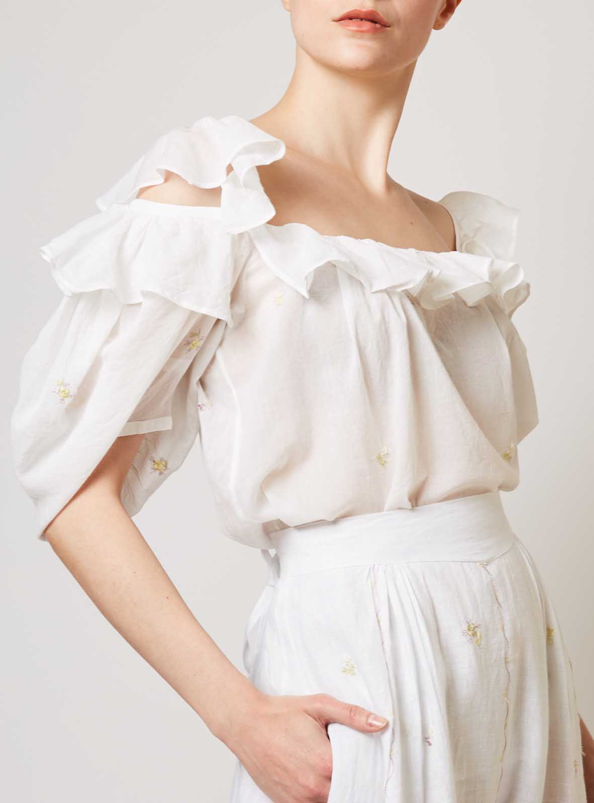 Side view of Venus boudoir white blouse by Thierry Colson