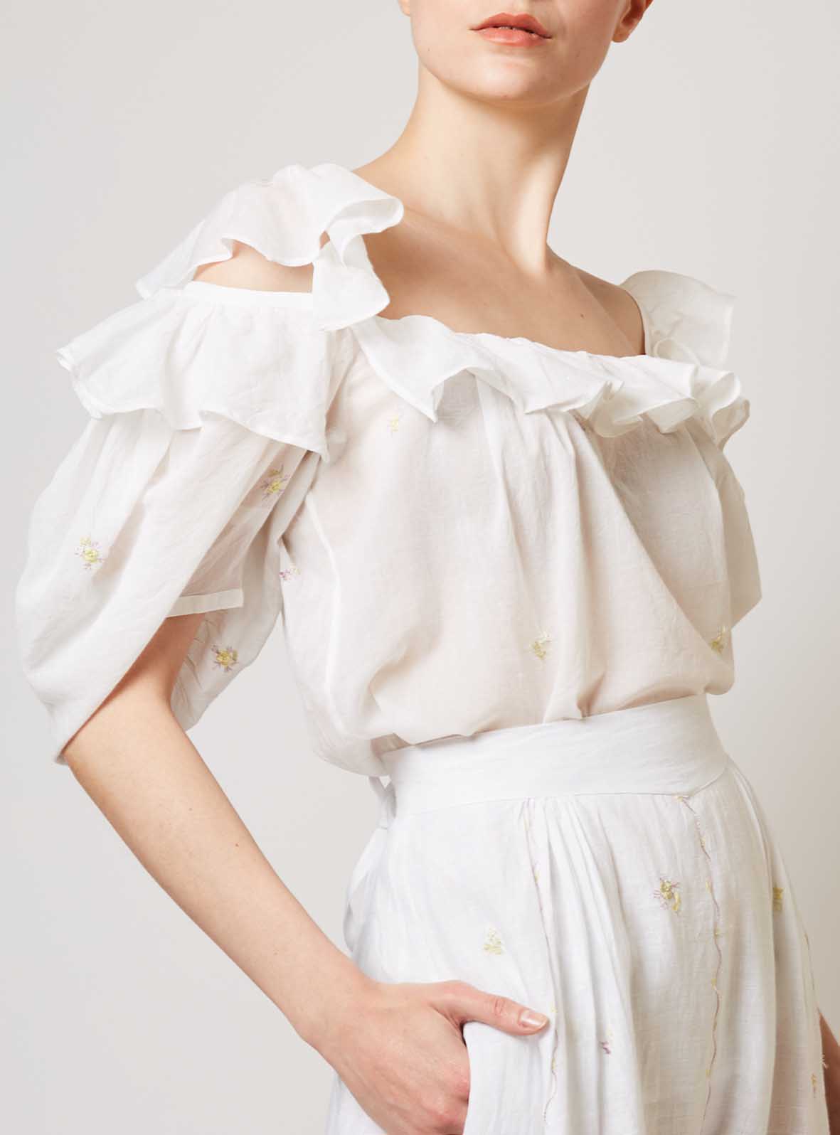 Side view of Venus boudoir white blouse by Thierry Colson 