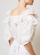 Back view of Venus boudoir white blouse by Thierry Colson