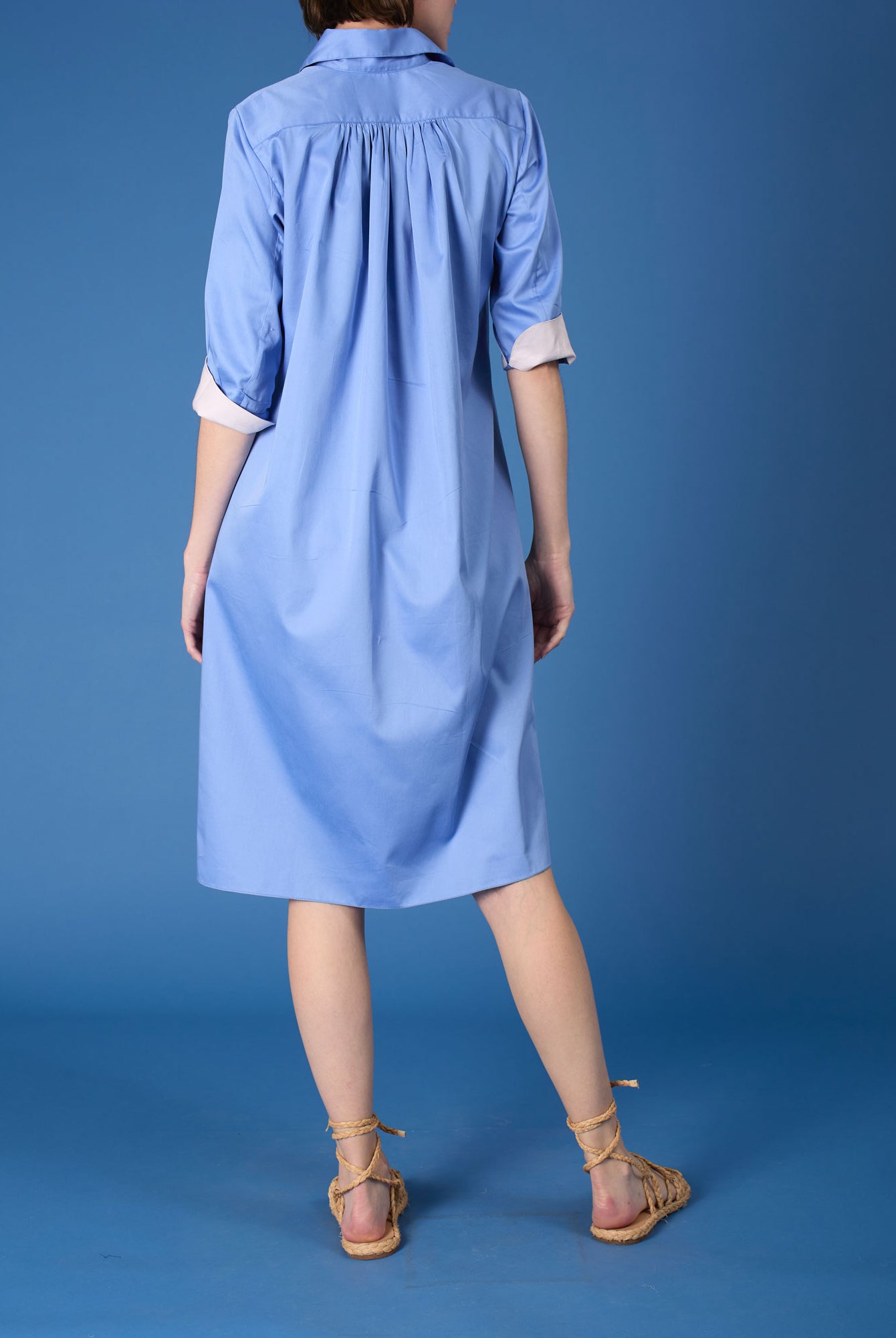 Back view of Angelica blue "Pervenche" shirt dress by Thierry Colson